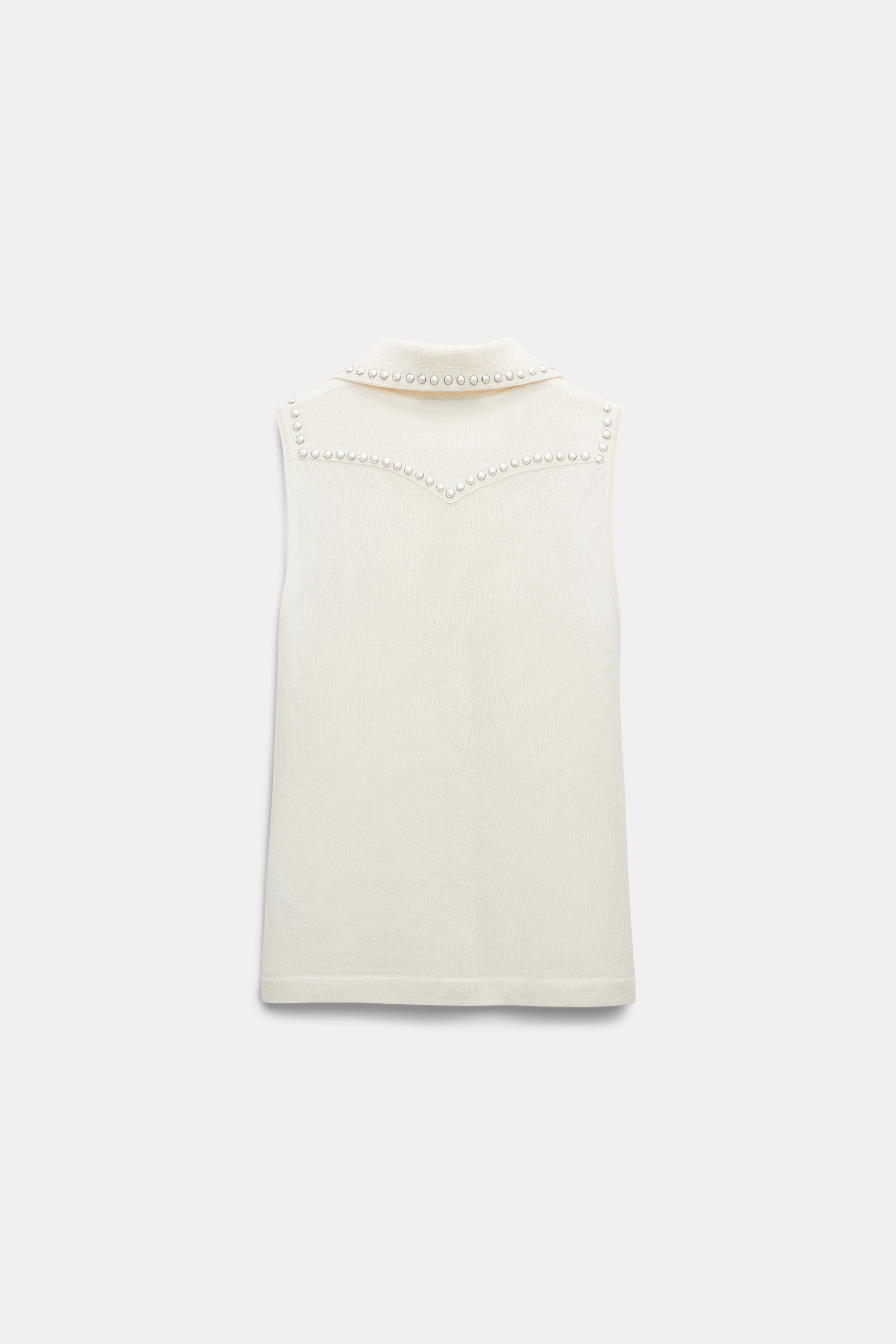 REFINED ESSENTIALS top