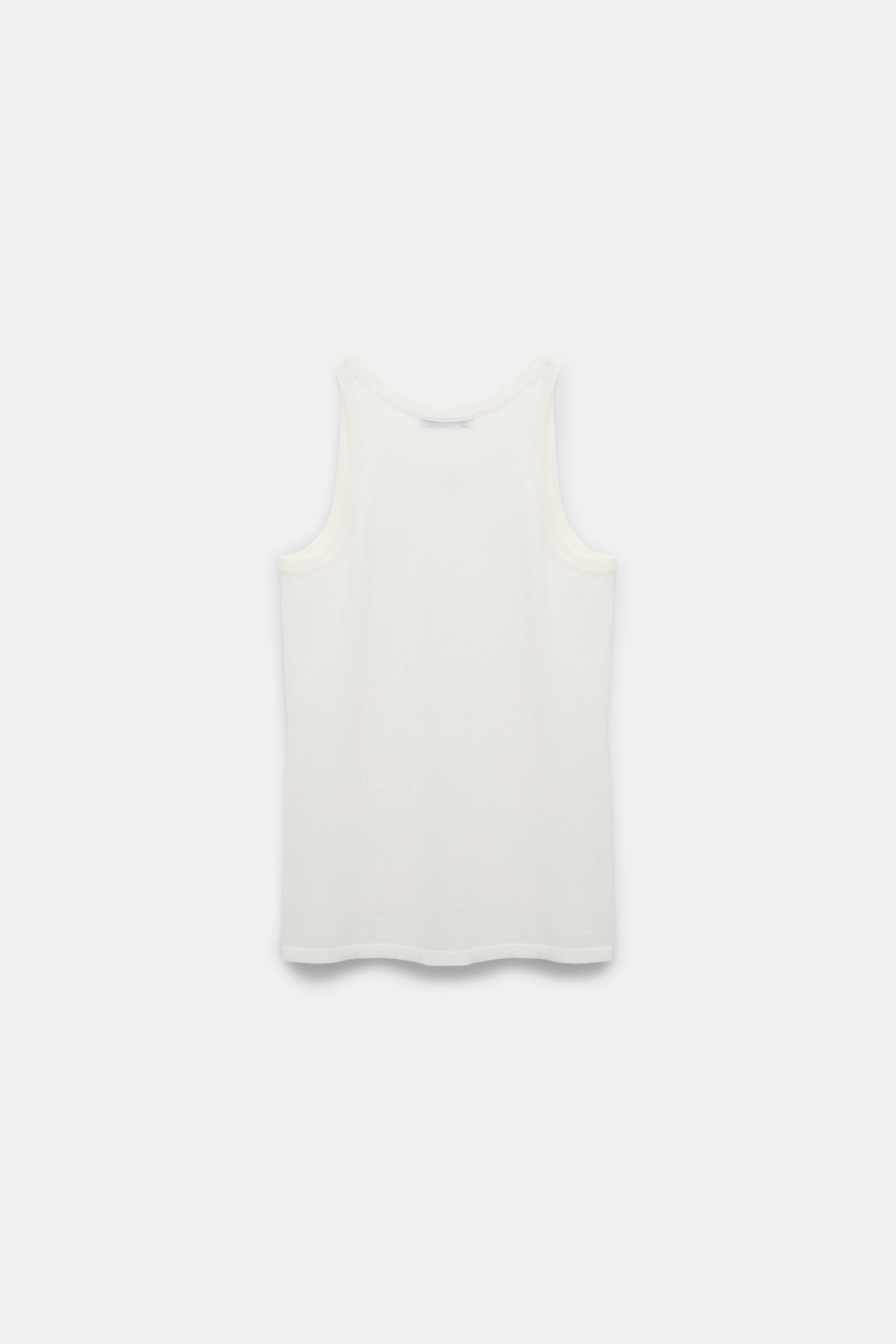 REFINED ESSENTIALS top