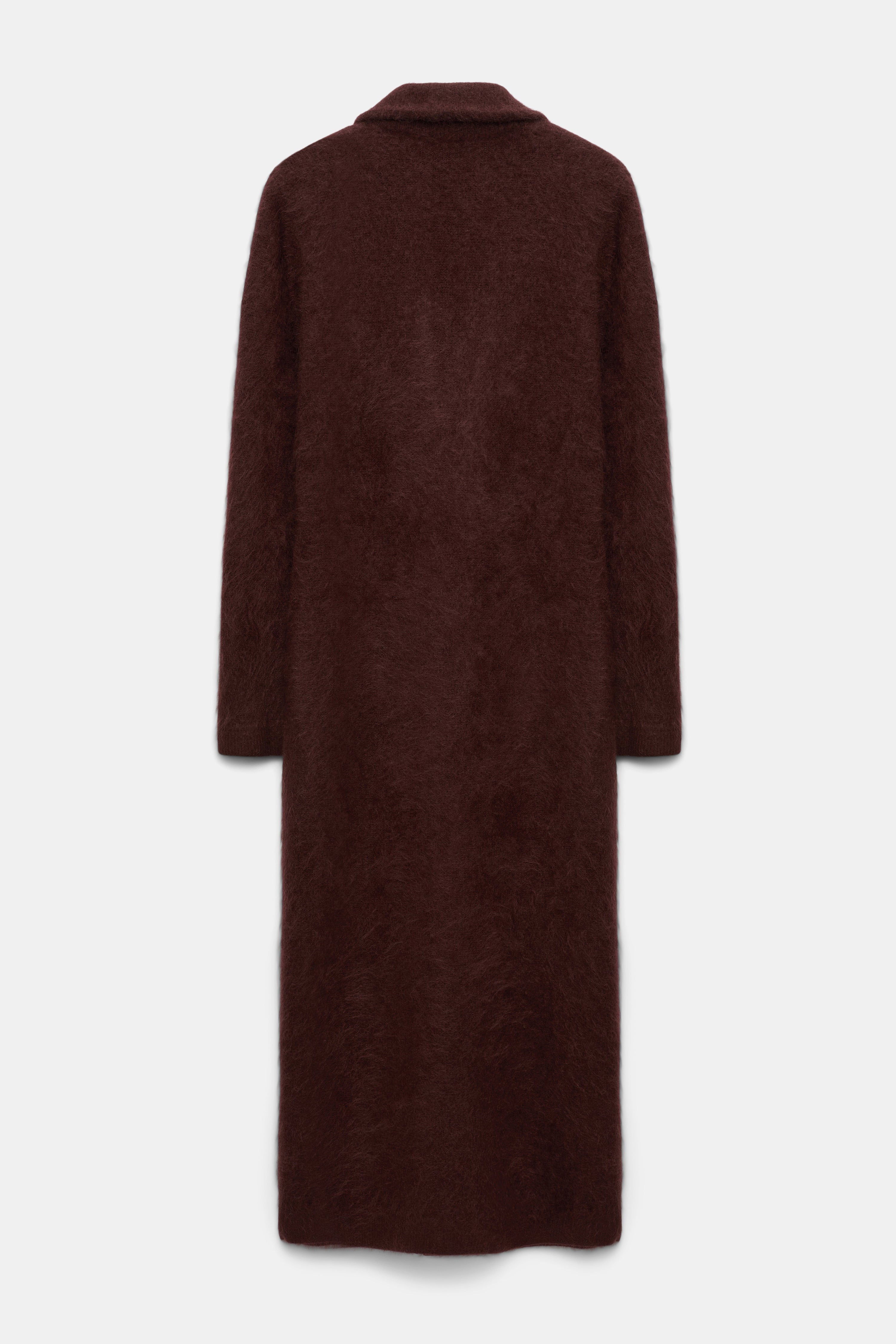 FLUFFY STATEMENT coat