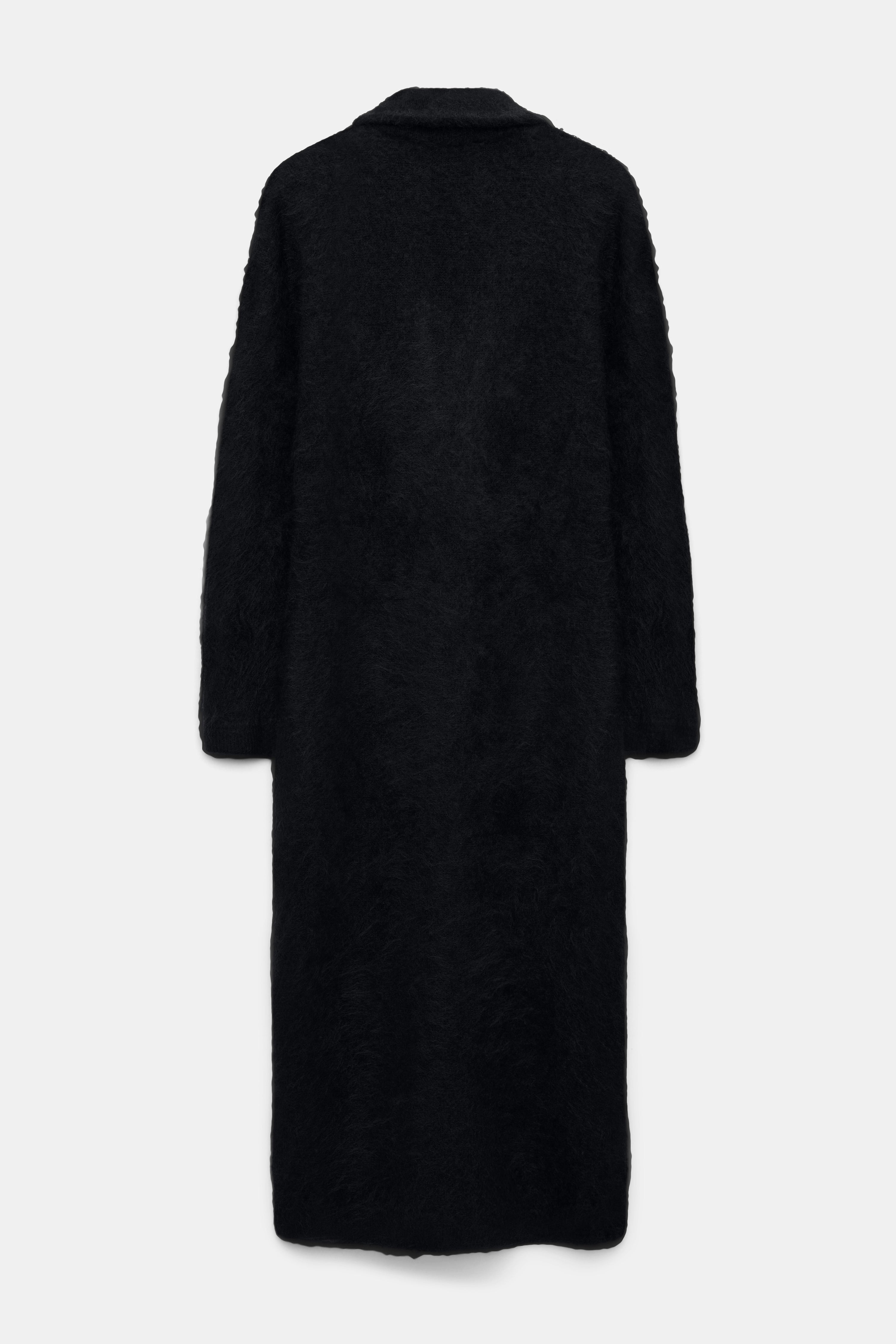 FLUFFY STATEMENT coat