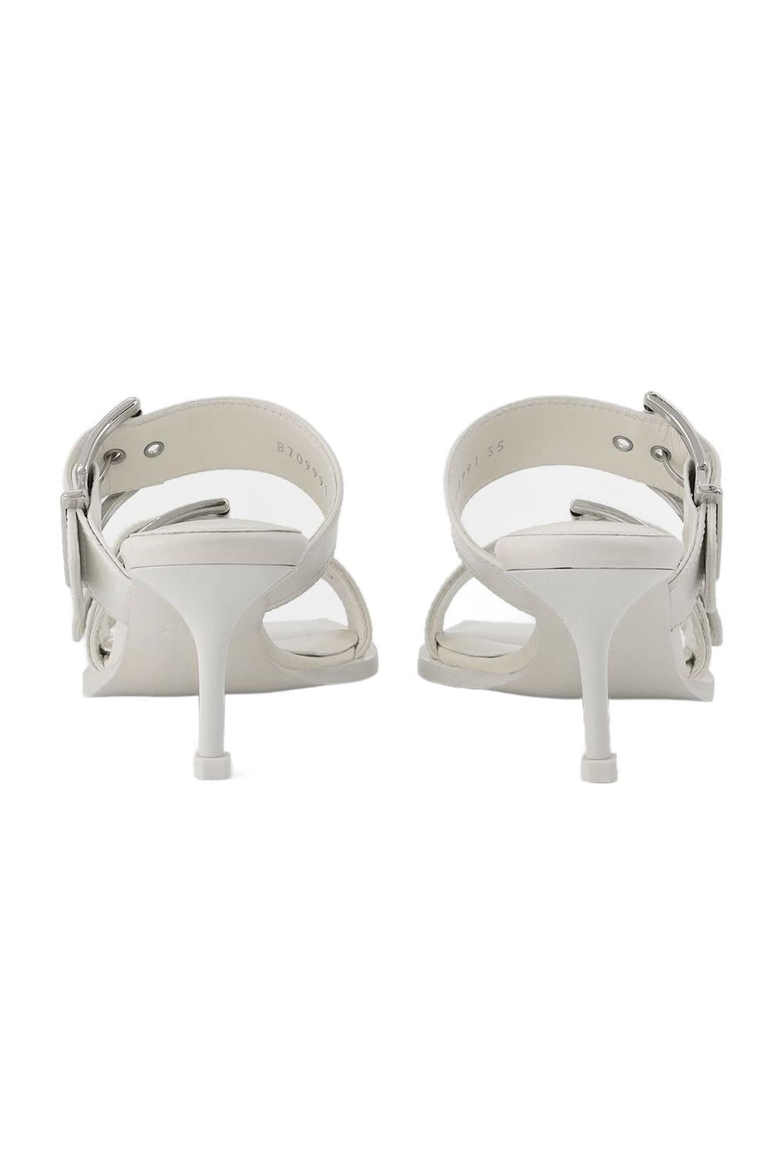 Pumps aus Leder in Elfenbein / Silber