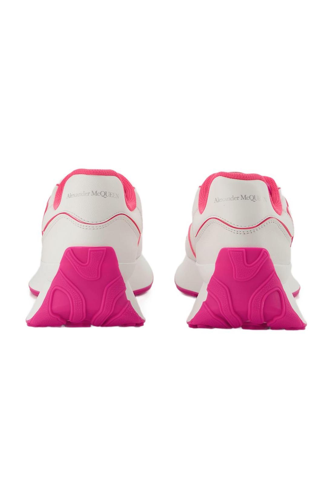 Sneakers aus weißem und silberfarbenem Leder