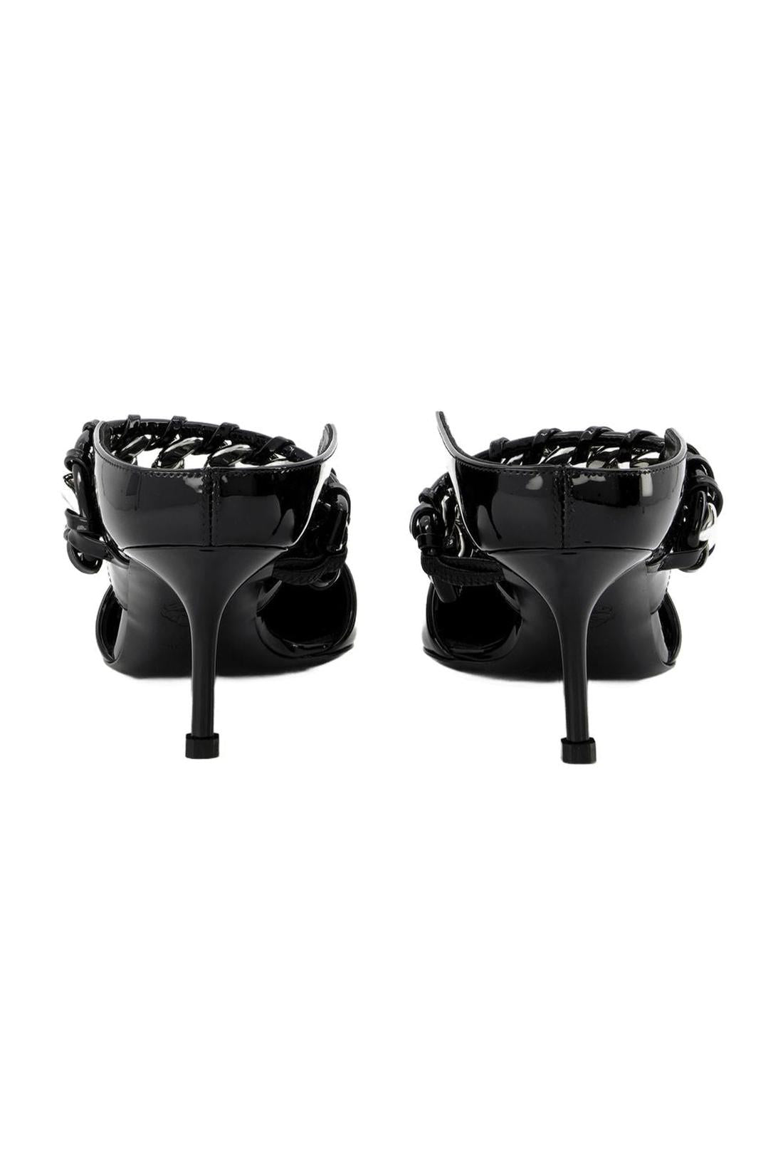 Sandalen aus schwarzem und silberfarbenem Leder