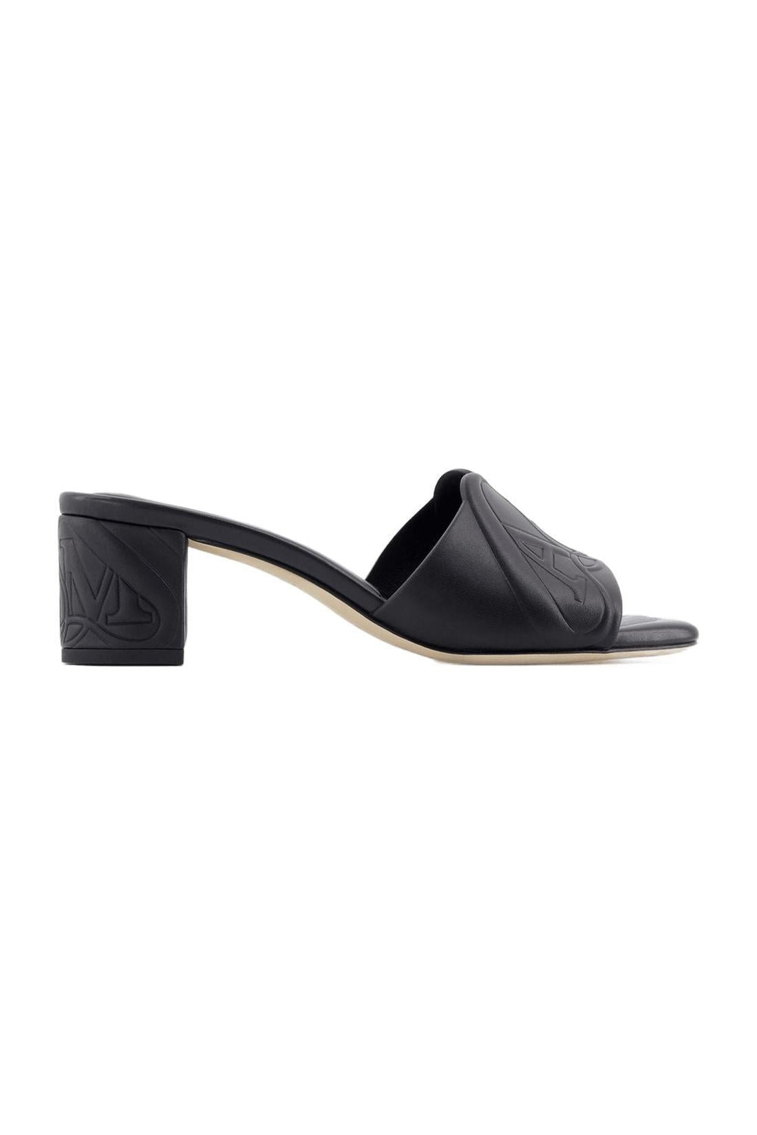 Seal heeled sandals - Alexander McQueen - leather - black