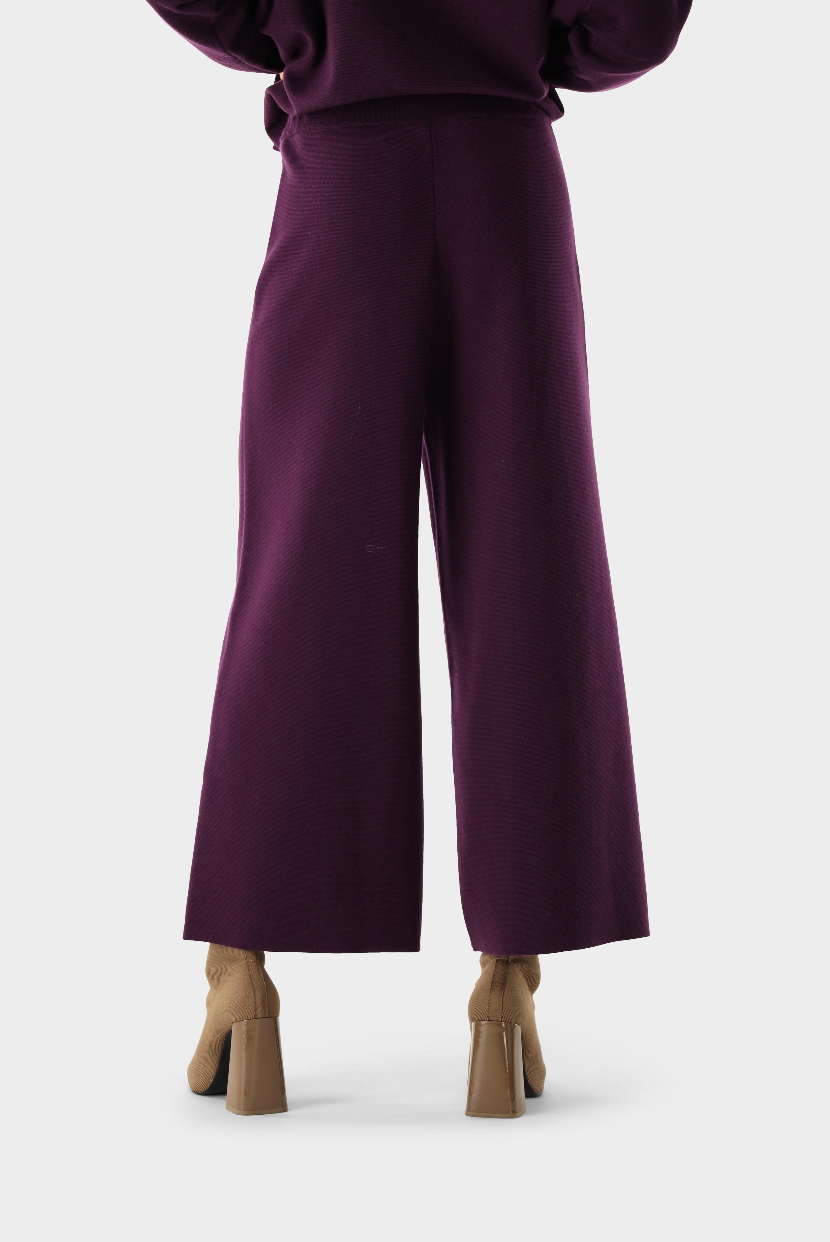 Knitted trousers with flared legs