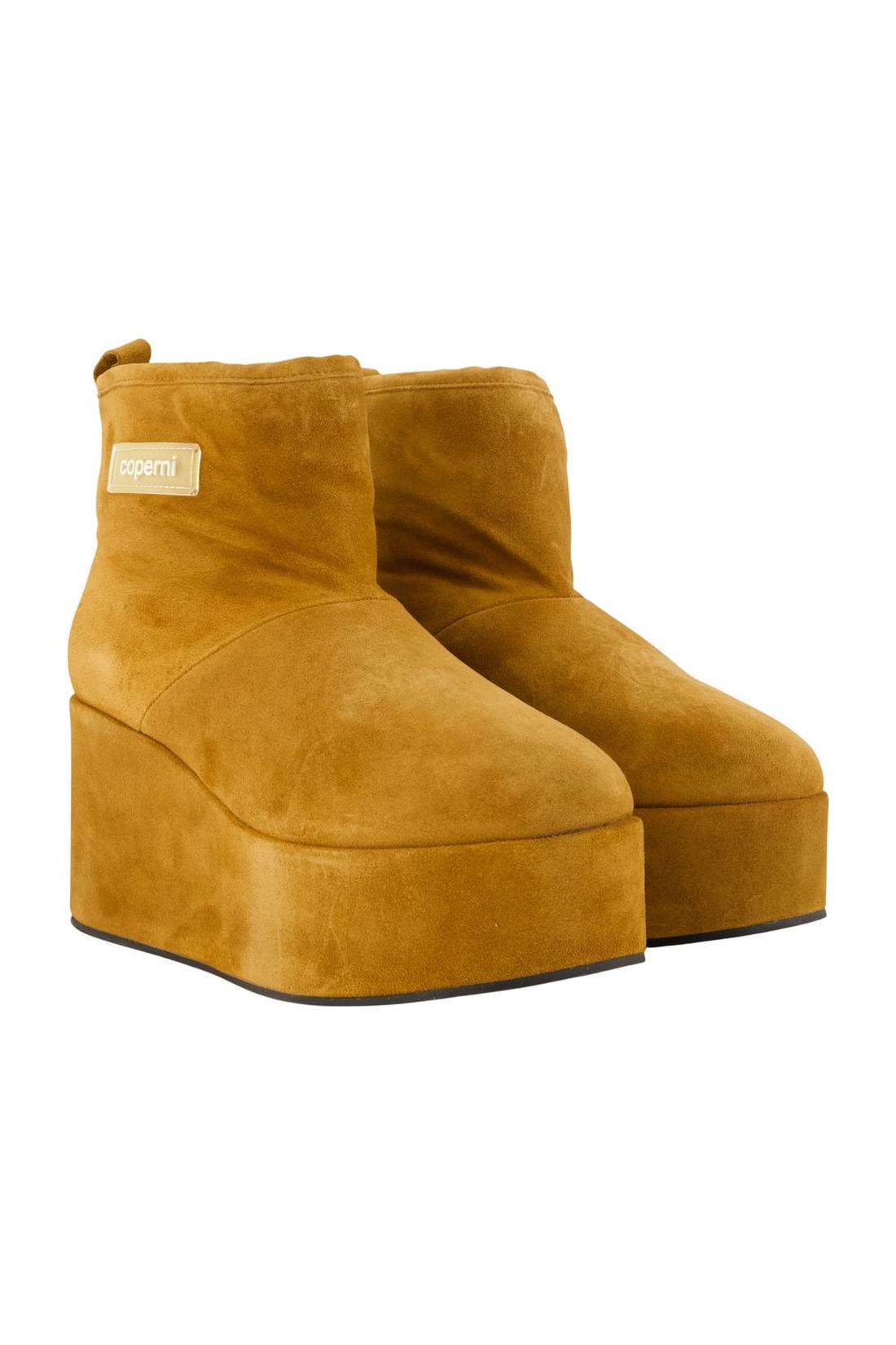 Shearling-Stiefel mit Keilabsatz – „ Coperni “ – Leder – Braun