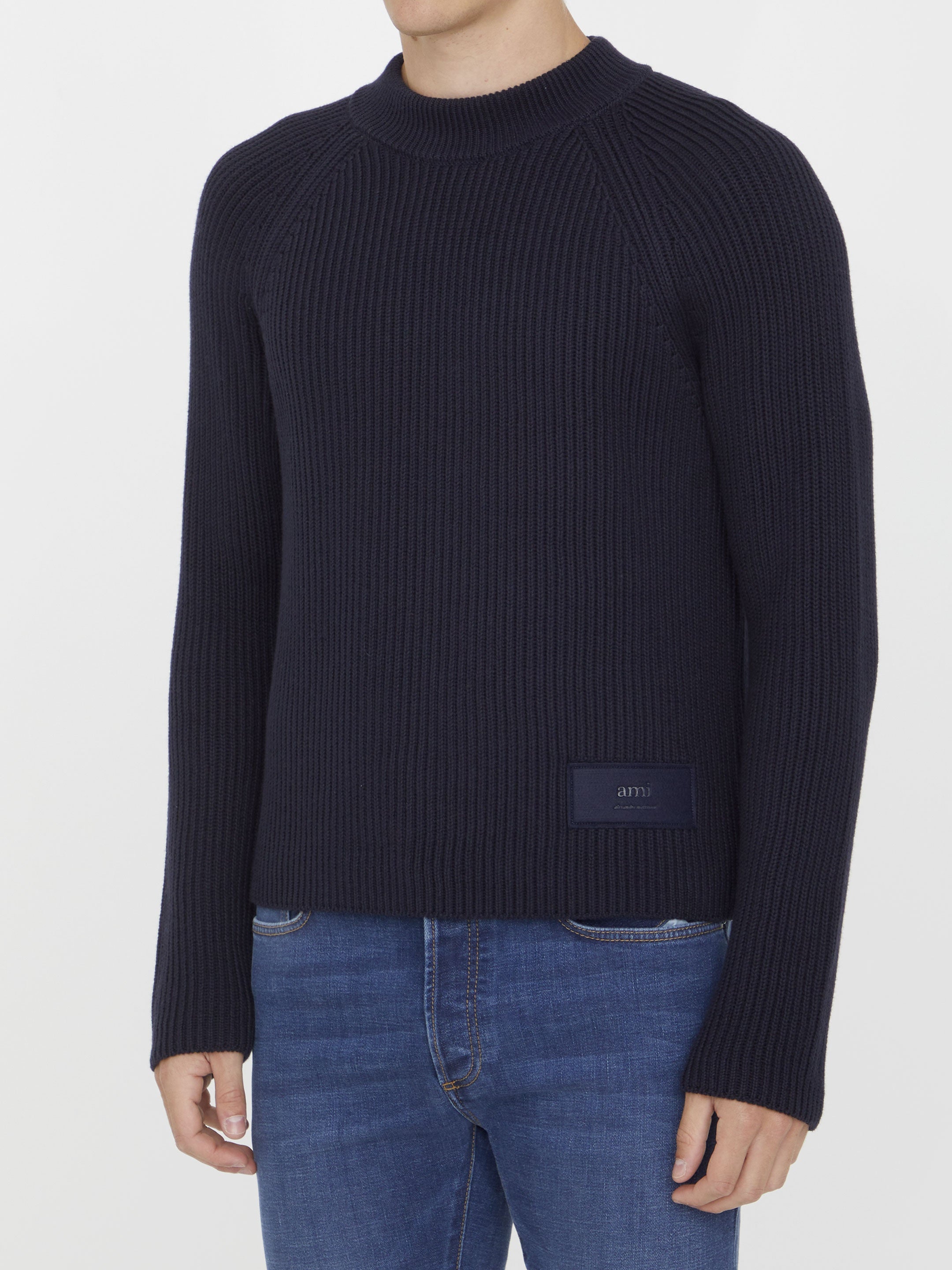 Blue jumper with patch
