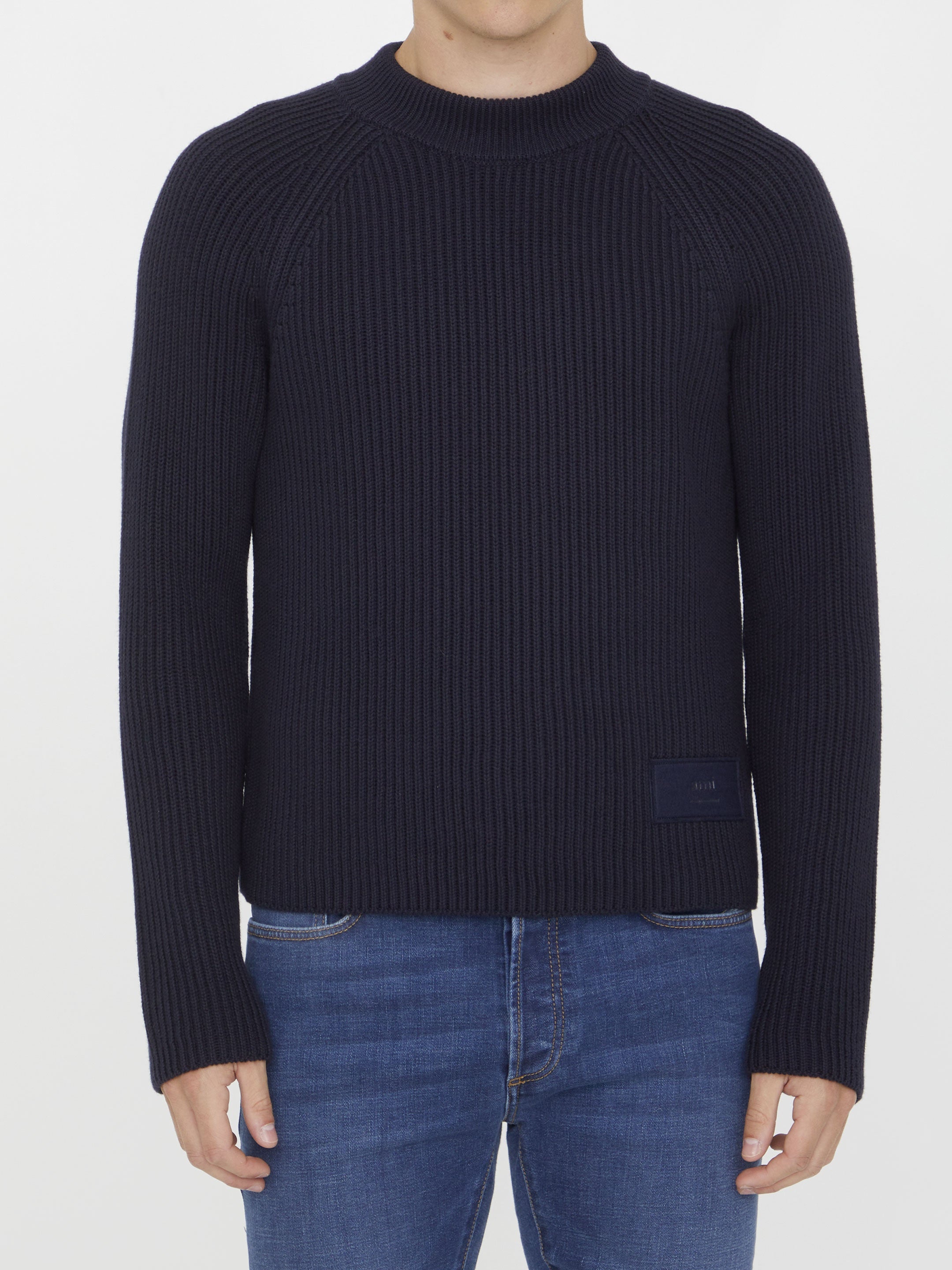 Blue jumper with patch