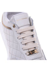 Sneakers in cream quilted leather