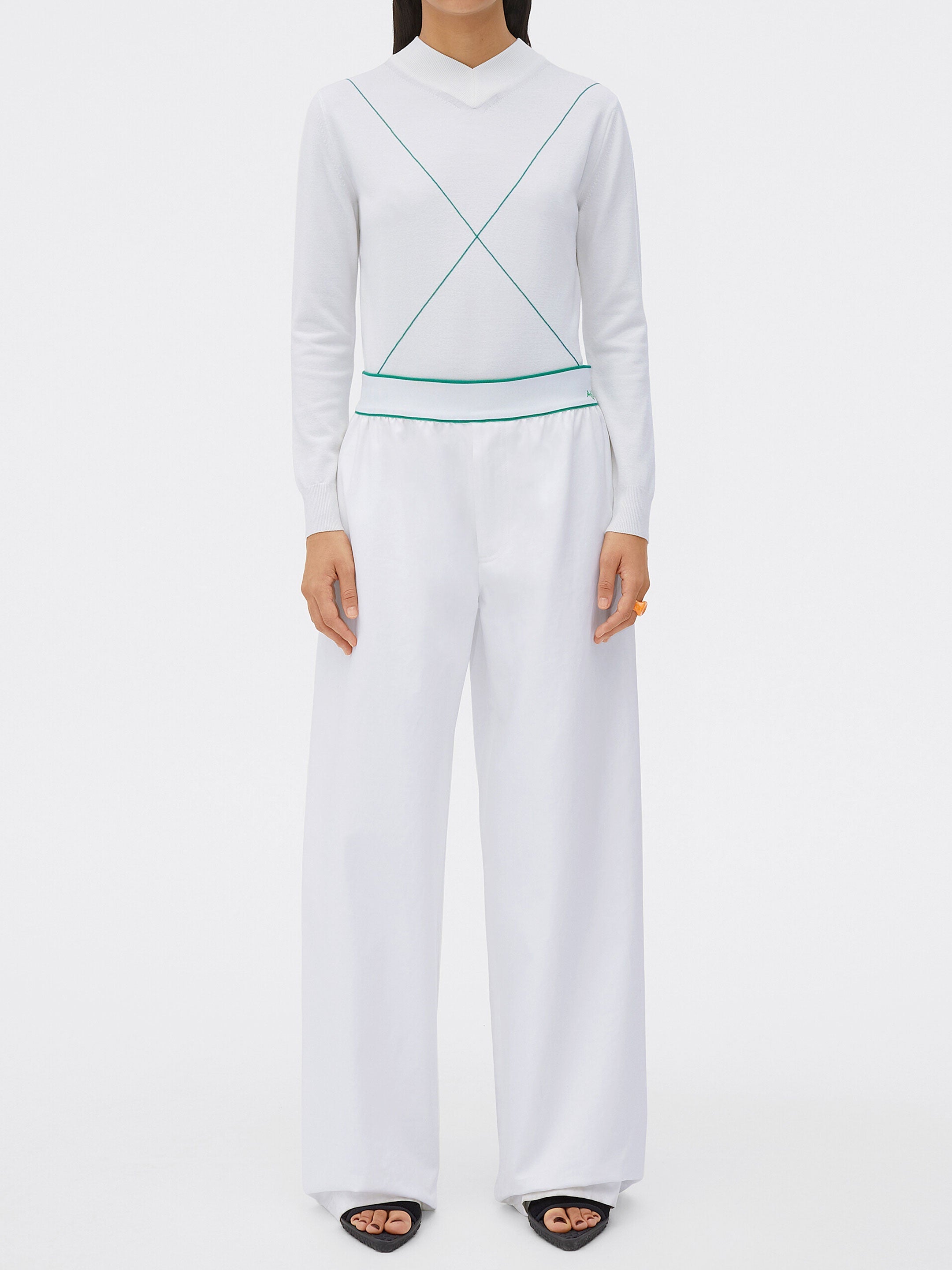 White trousers with logo