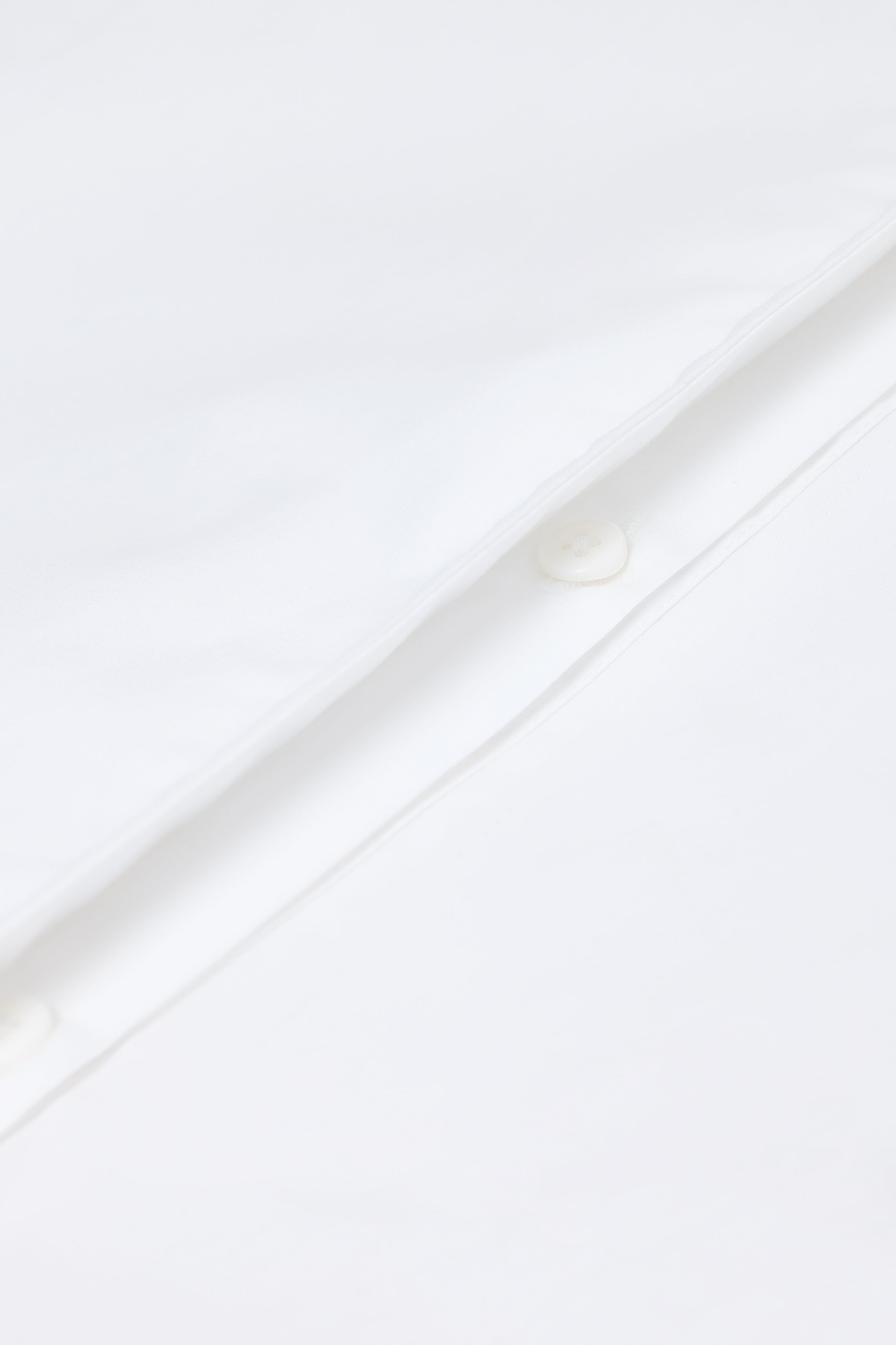 ASYMMETRIC SHIRT
