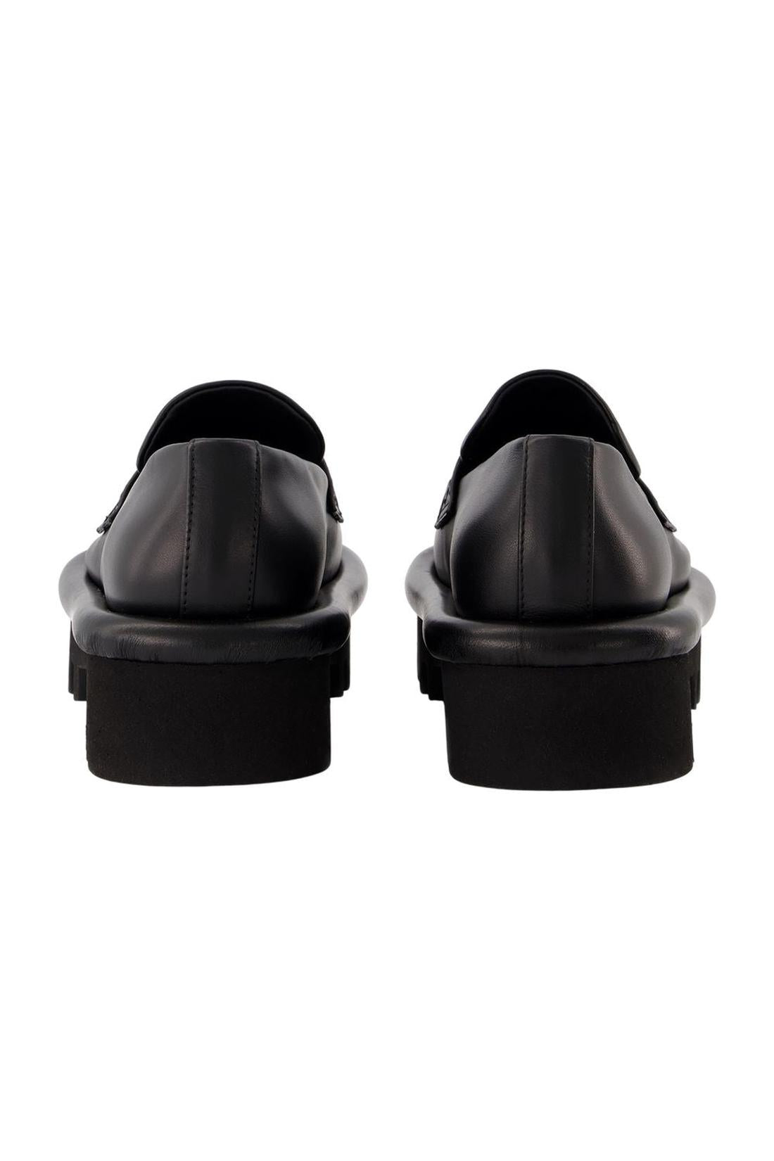 Schuhe Bumper Chunky aus schwarzem Leder