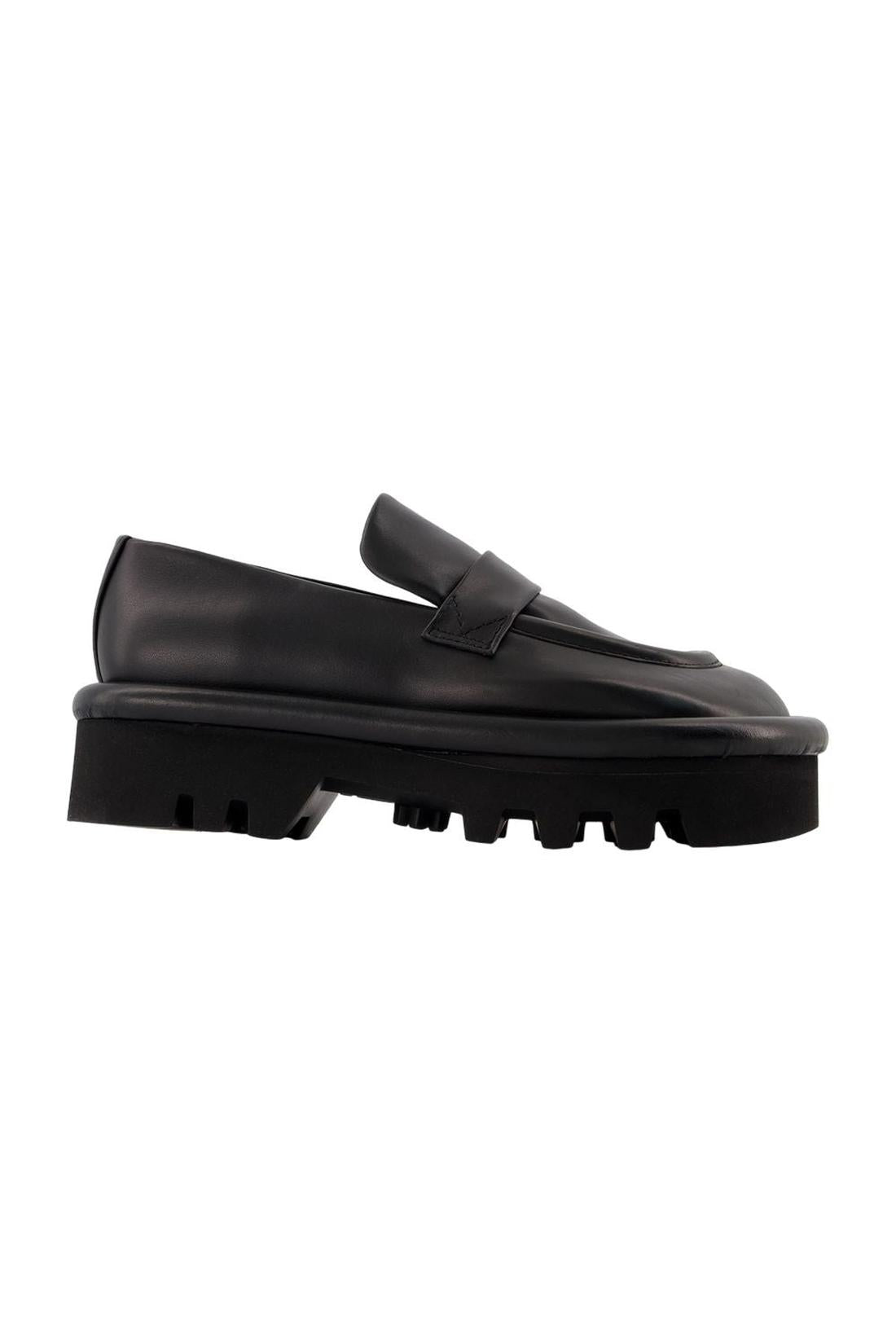 Schuhe Bumper Chunky aus schwarzem Leder
