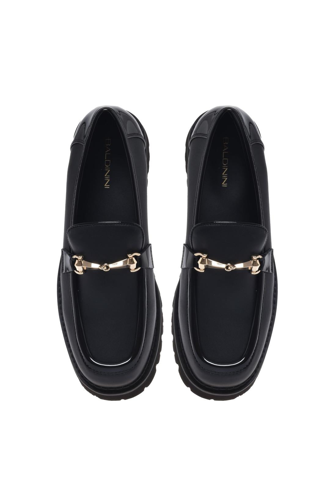 Loafer in black leather and patent