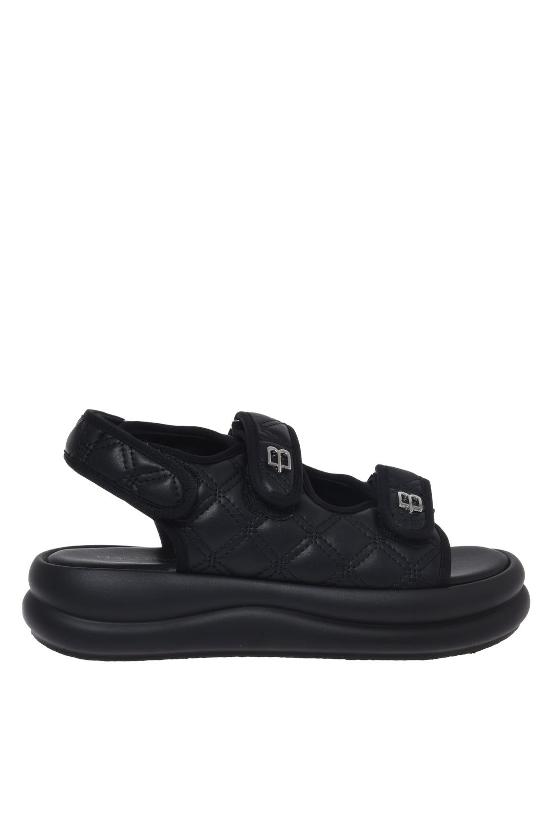 Sandal in black quilted faux leather