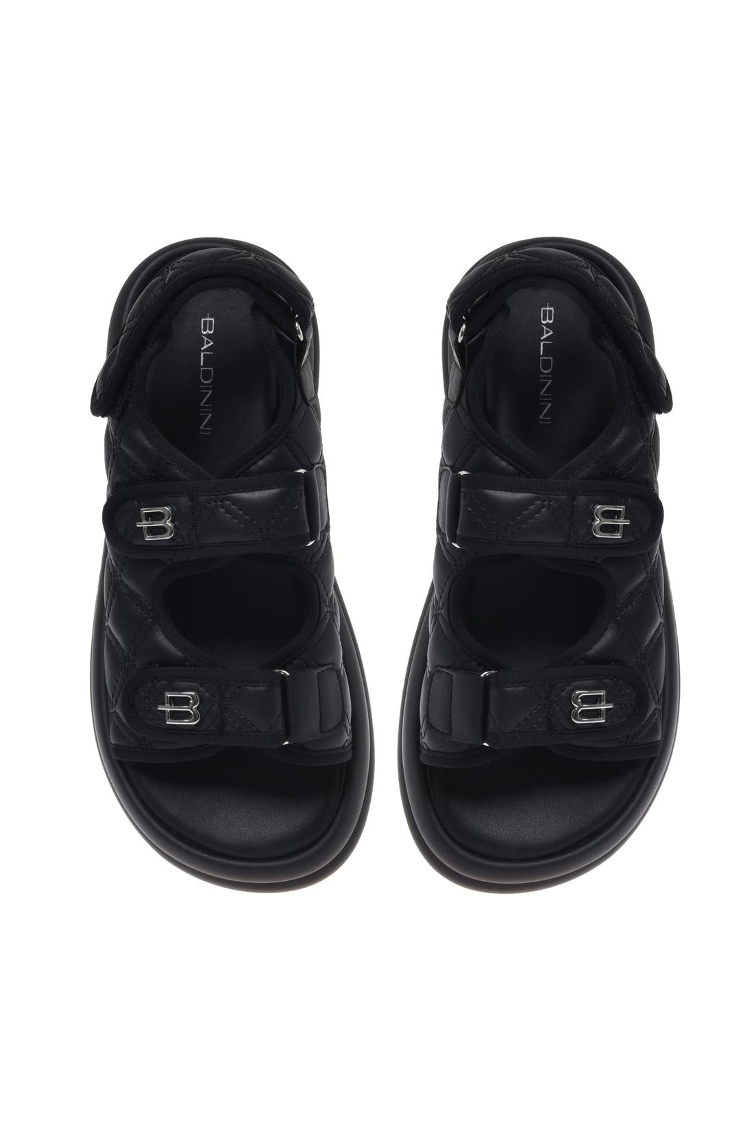 Sandal in black quilted faux leather
