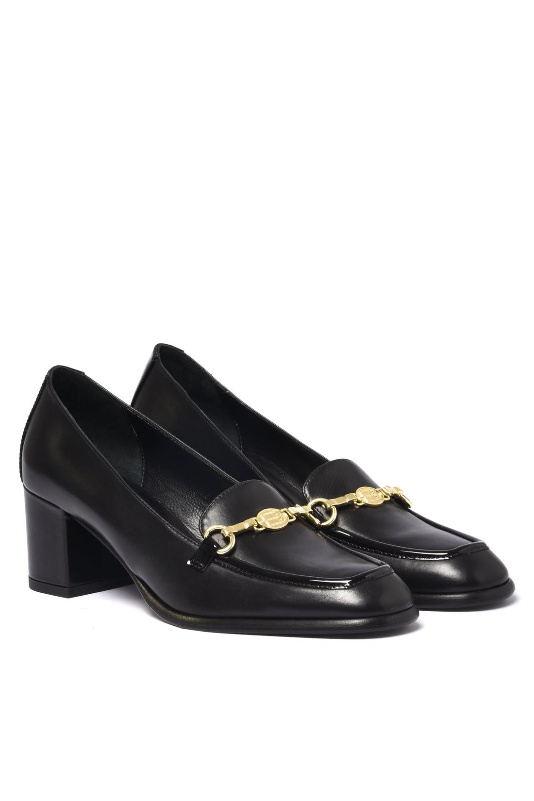 Black leather heeled loafers