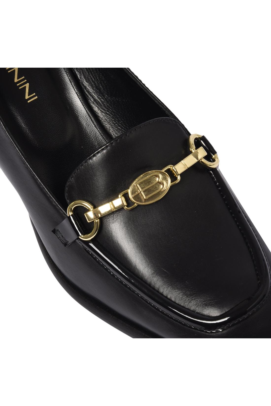 Black leather heeled loafers