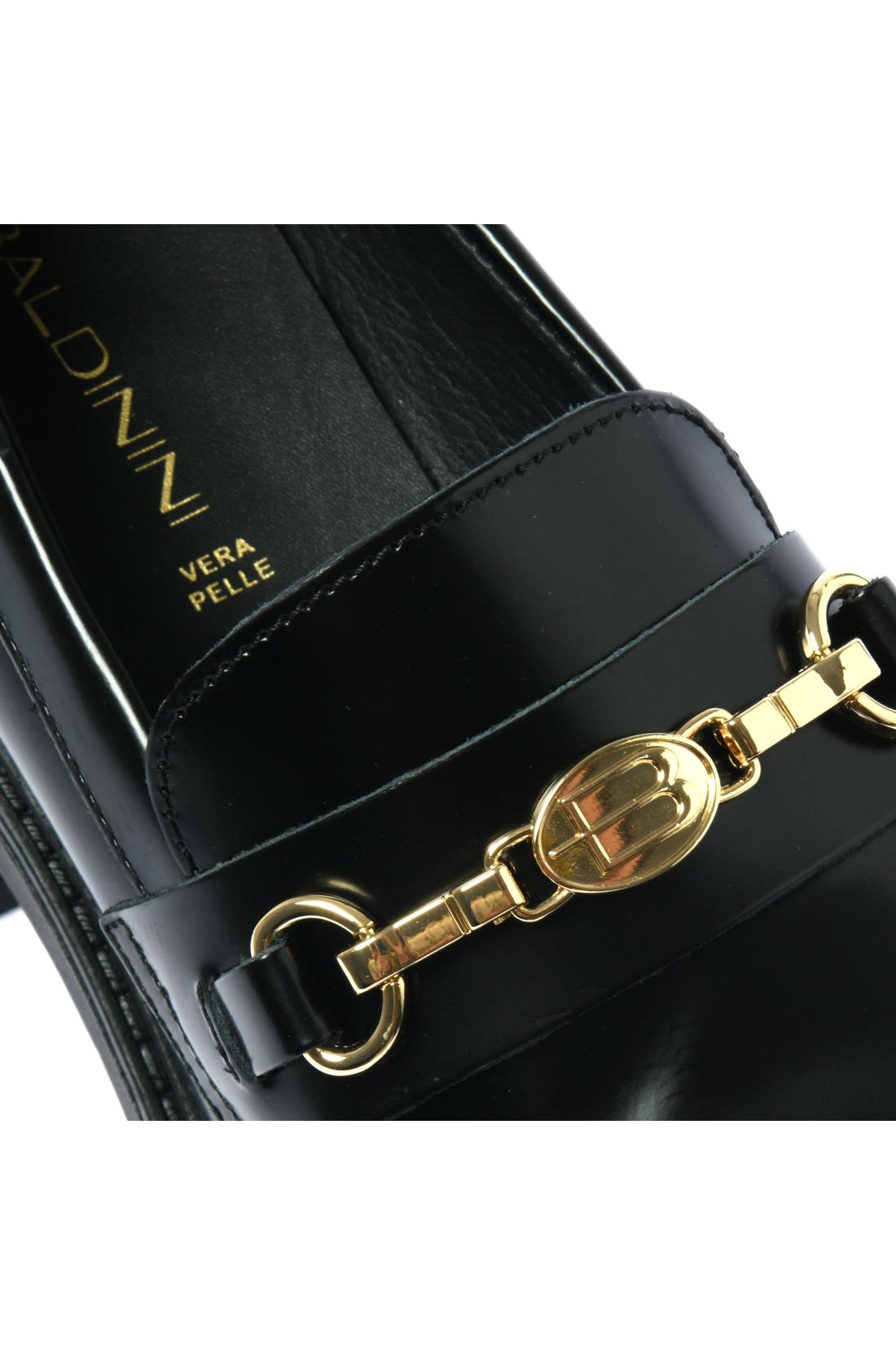 Black polished leather heeled loafer