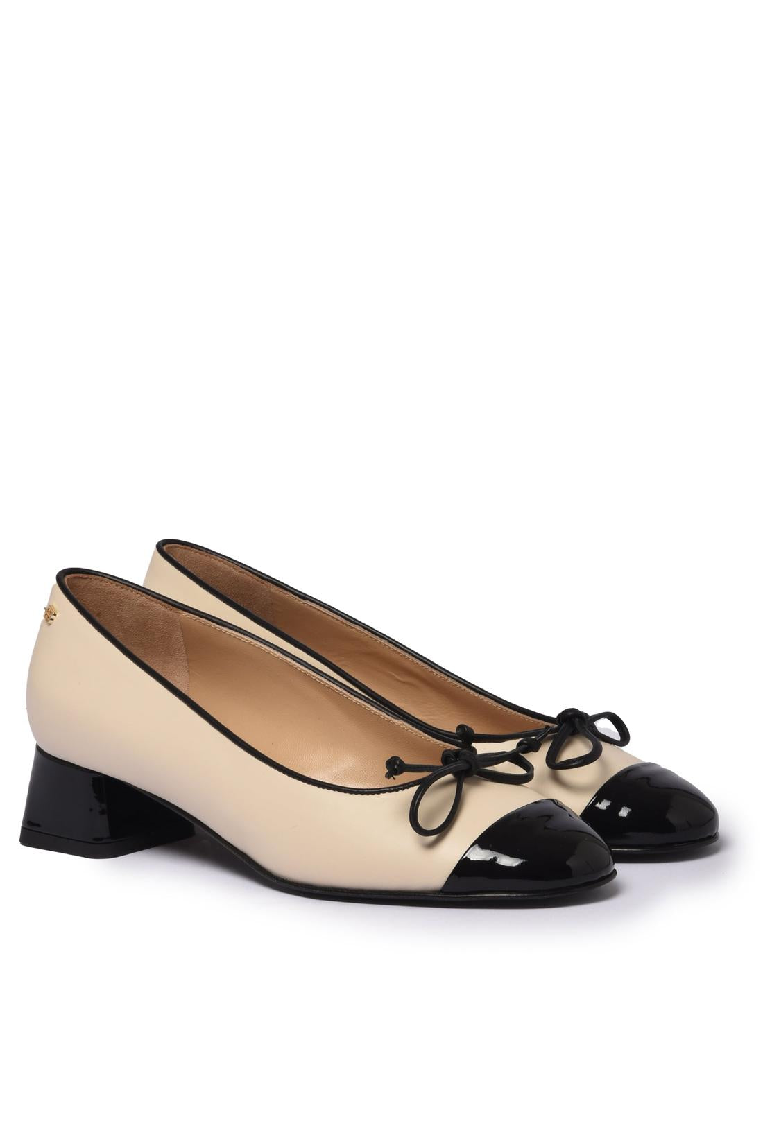 Black patent leather and off-white leather pump