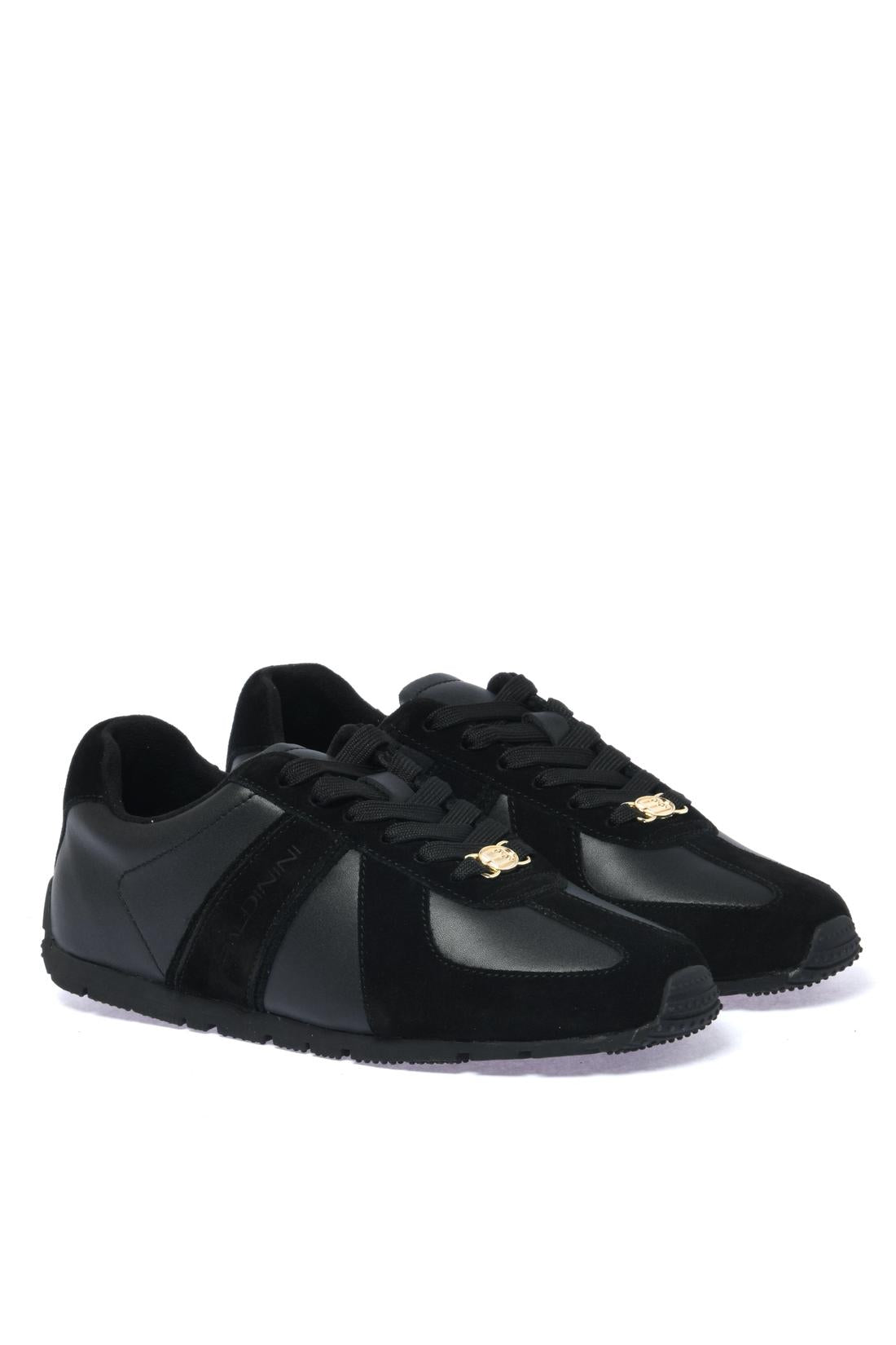Sneaker in black leather and suede