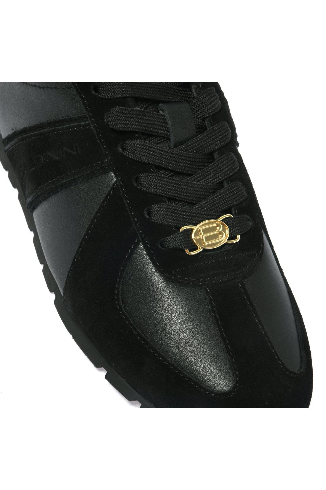 Sneaker in black leather and suede