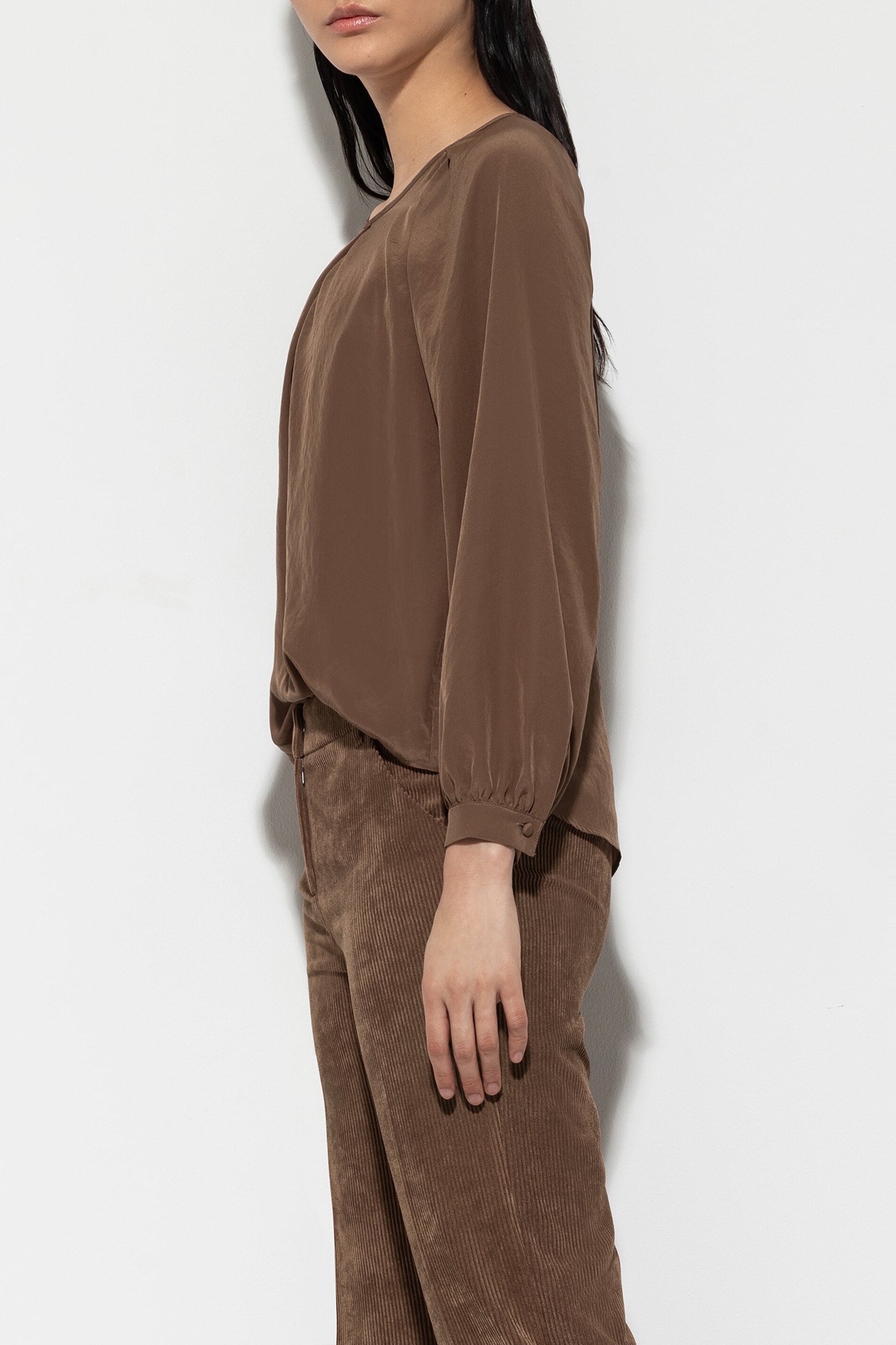 Blouse with pleated details