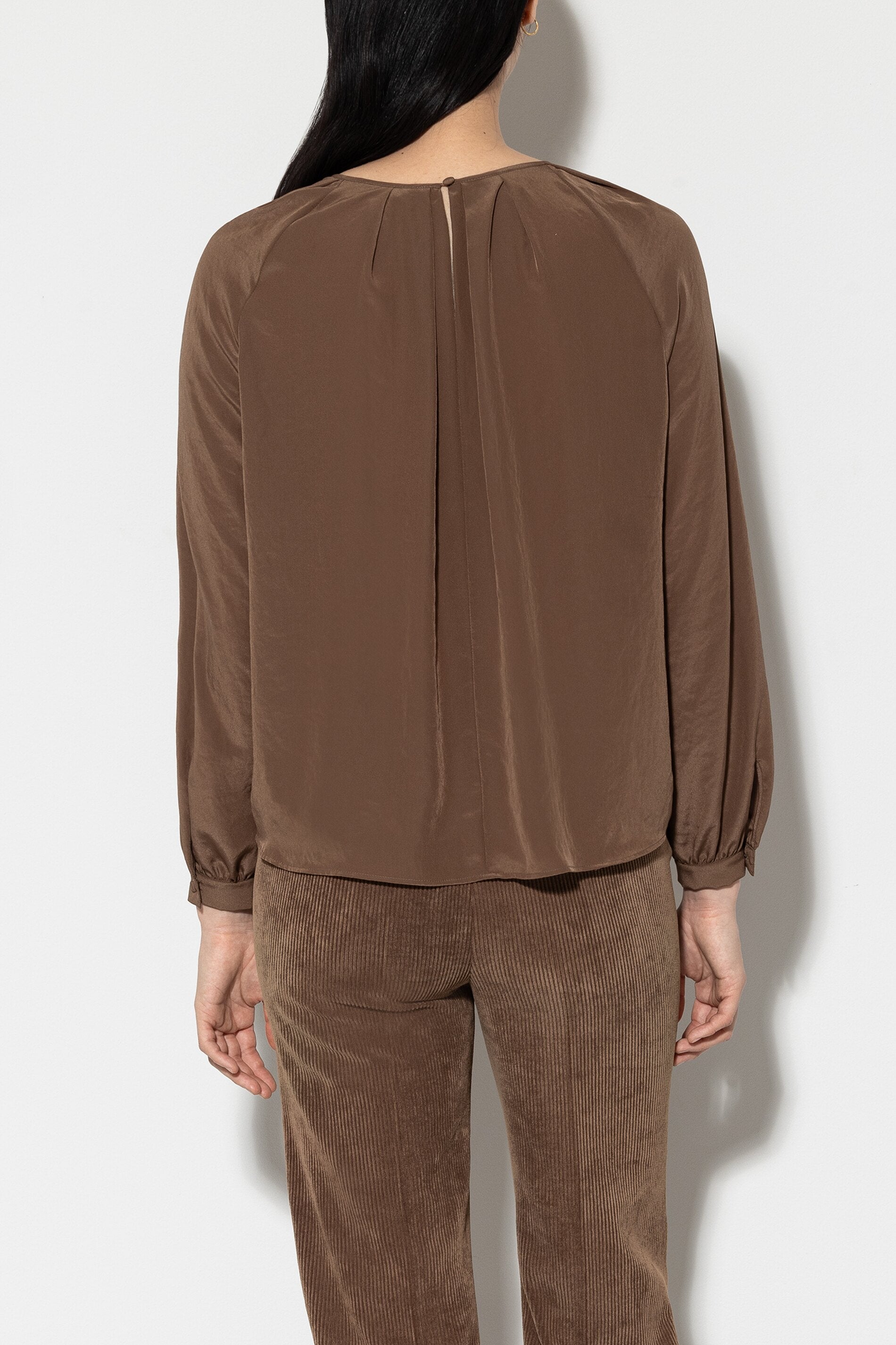 Blouse with pleated details