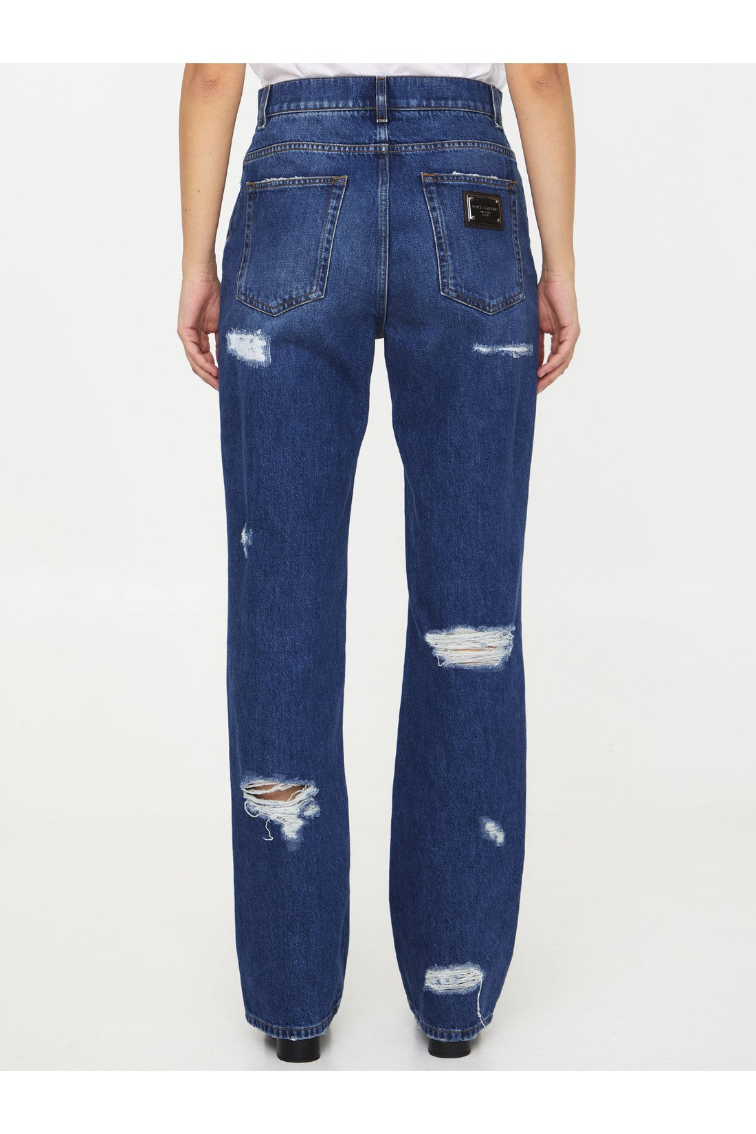 Distressed jeans with Leo print