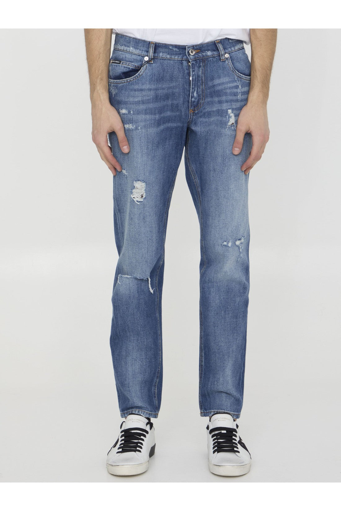 Distressed denim jeans