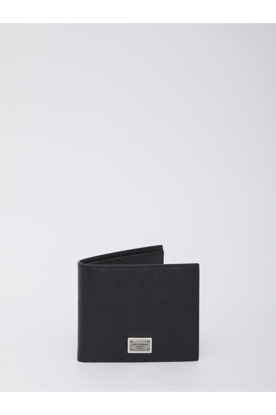 Bi-fold wallet in leather