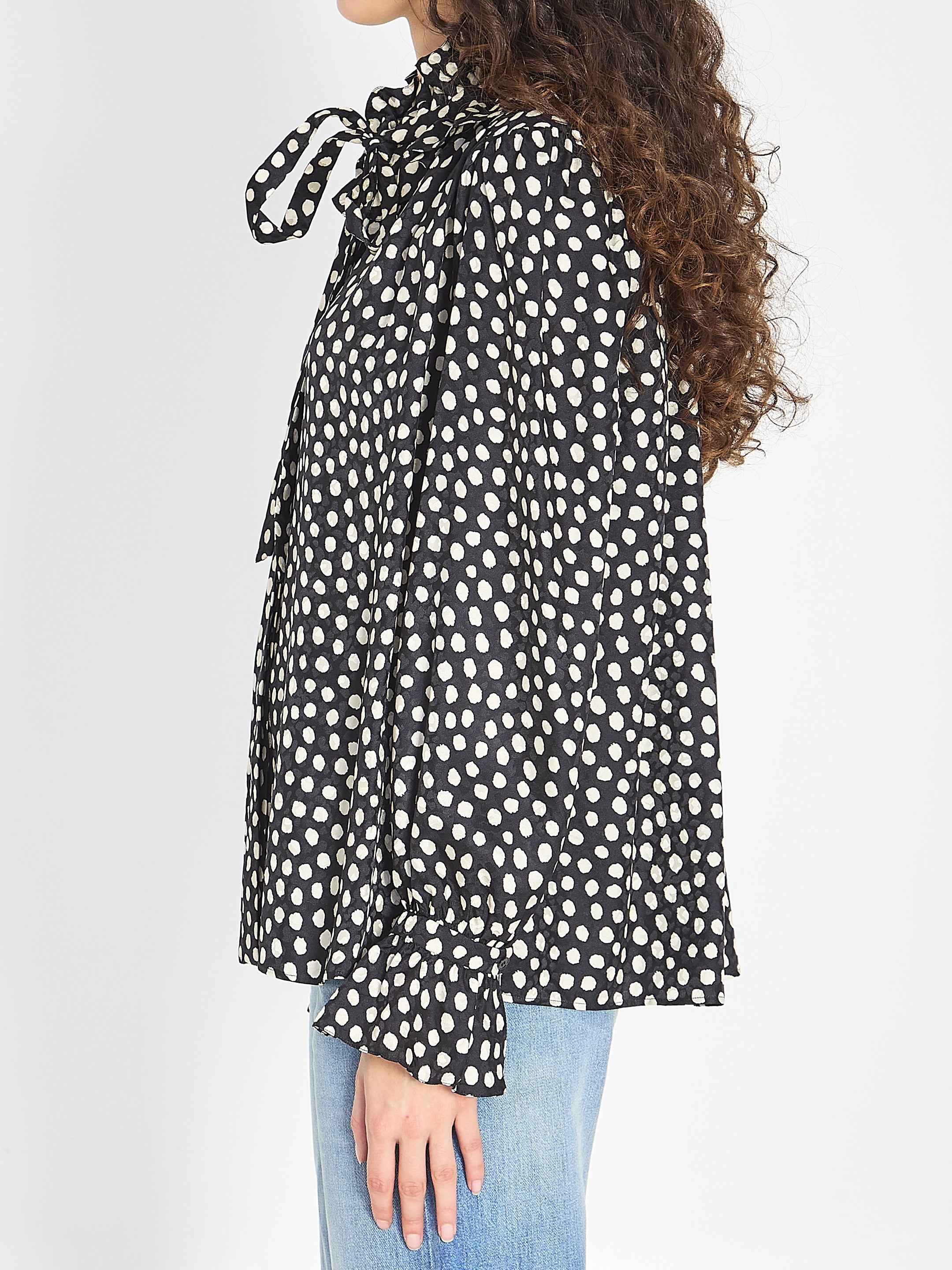 Polka dot blouse with ruffles