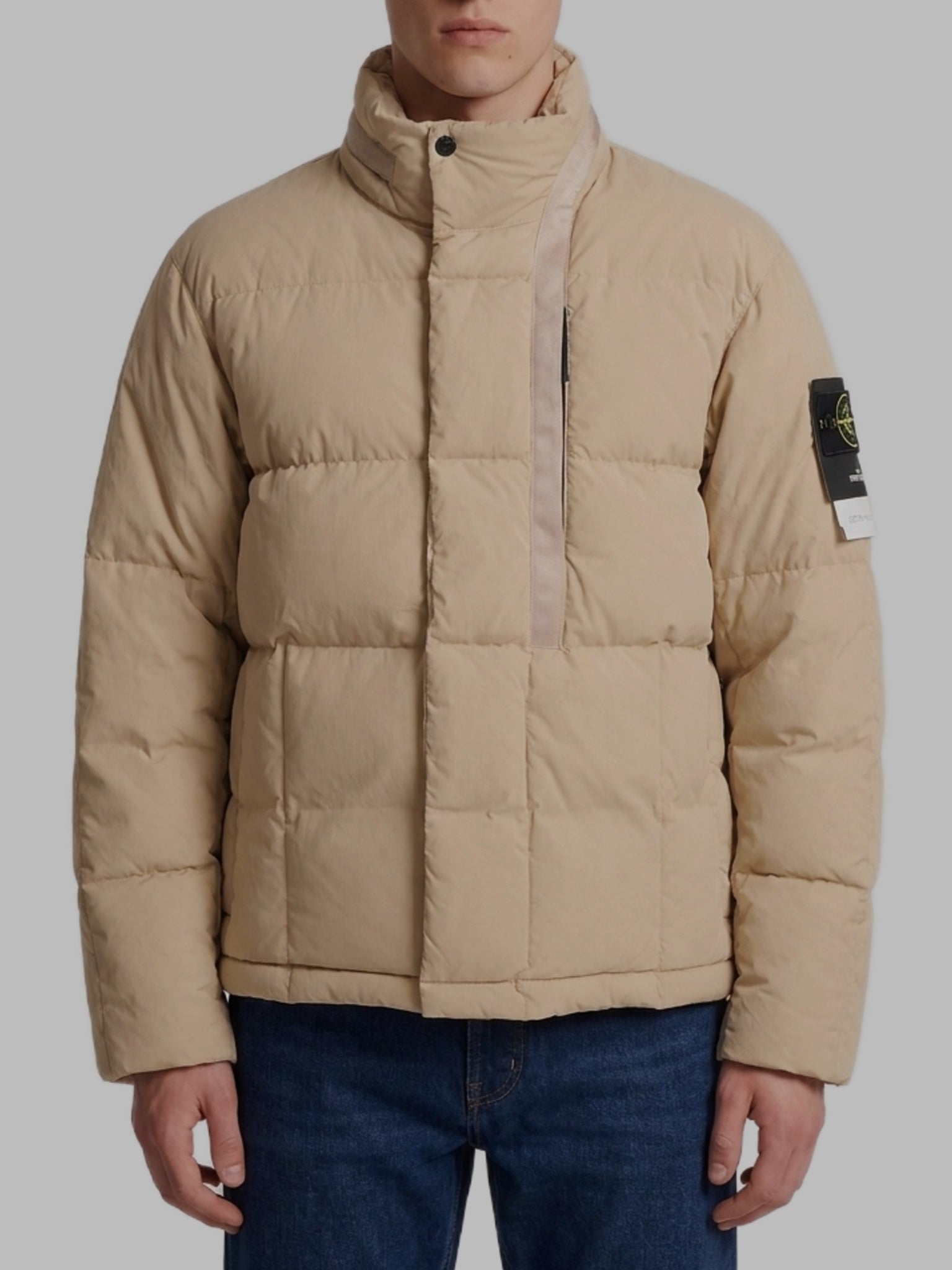 Beige cotton and nylon canvas down jacket.
