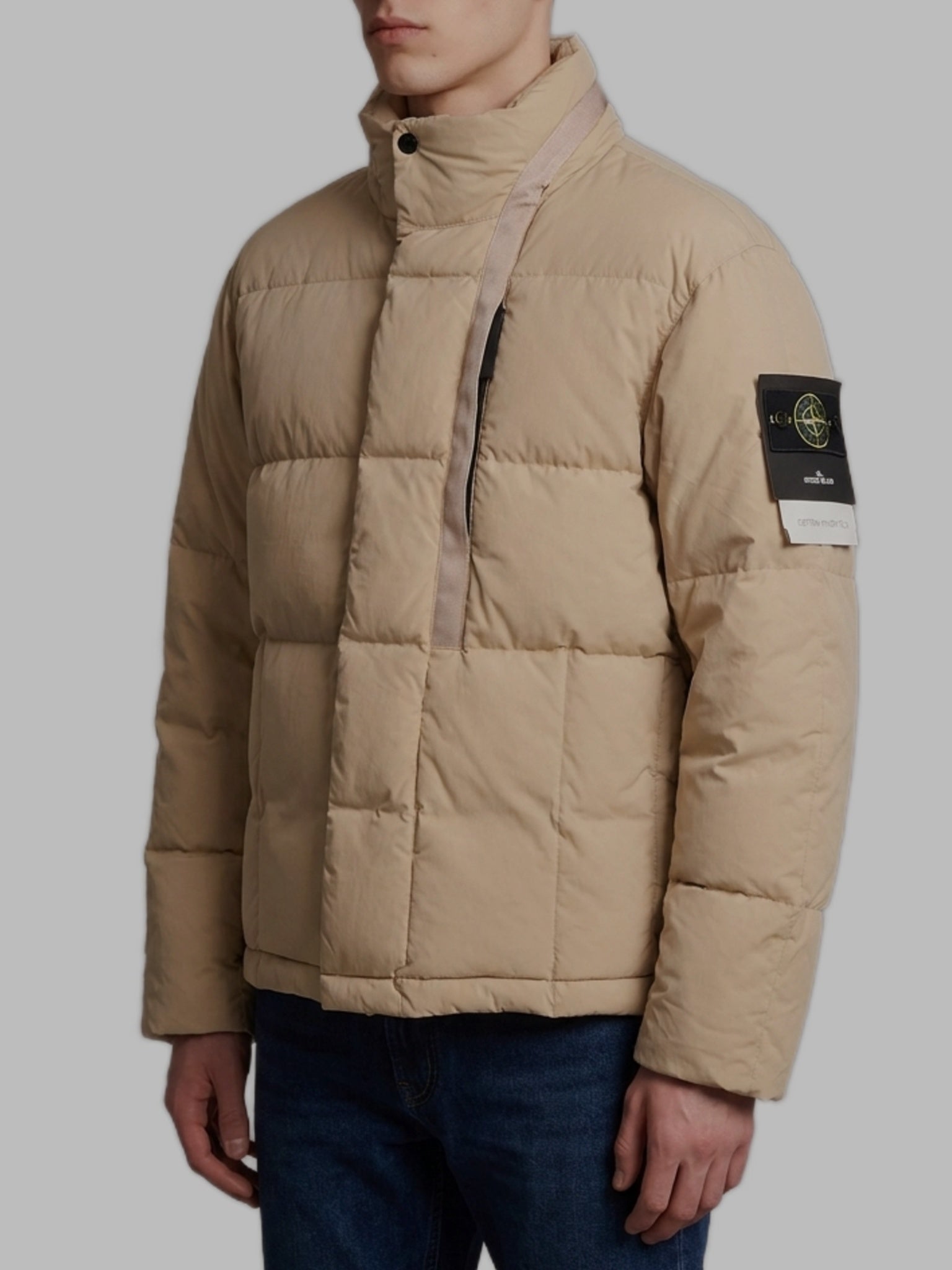 Beige cotton and nylon canvas down jacket.