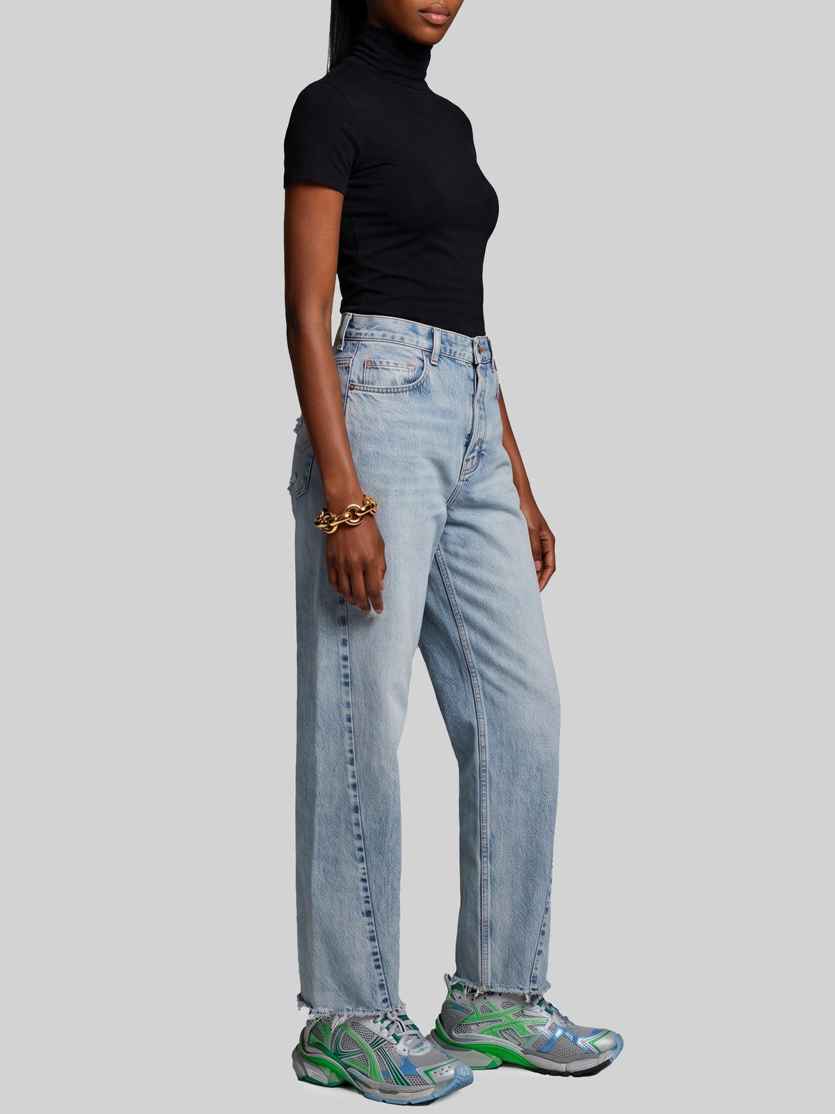 Light blue faded jeans with twisted seams