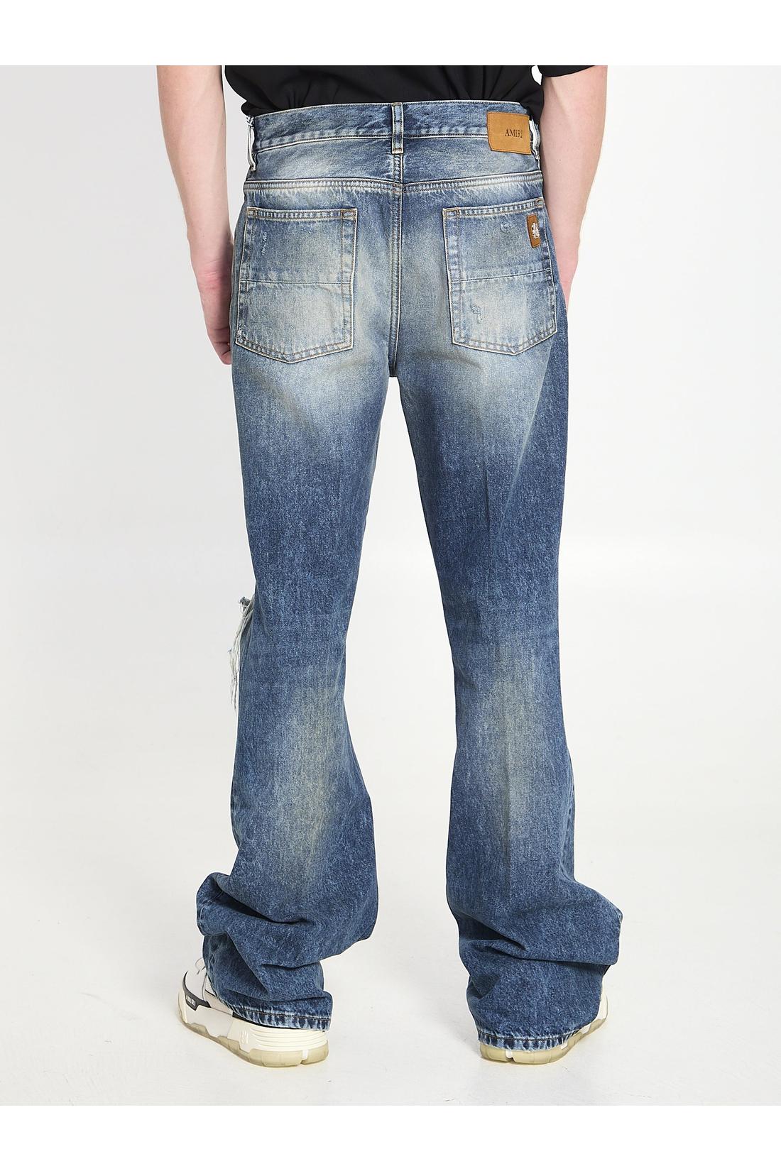Slashed boot cut jeans-Jeans-Amiri-ARCHIVIST