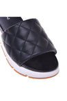 Slipper in black quilted leather