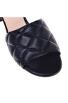 Slipper in black quilted leather