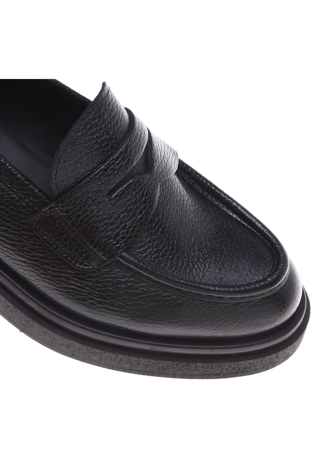 Loafers in black tumbled leather