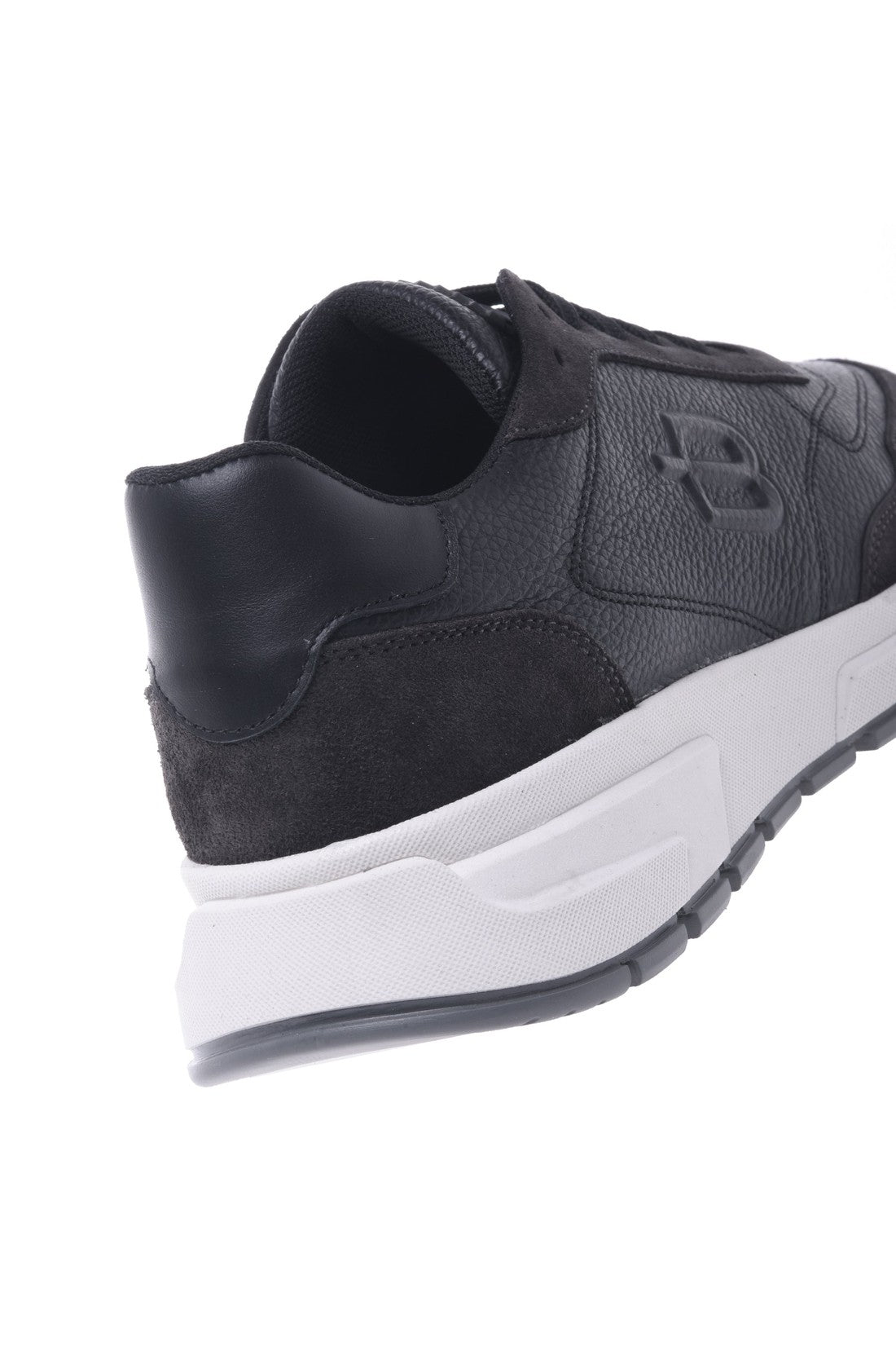 Trainers in black leather and tumbled leather