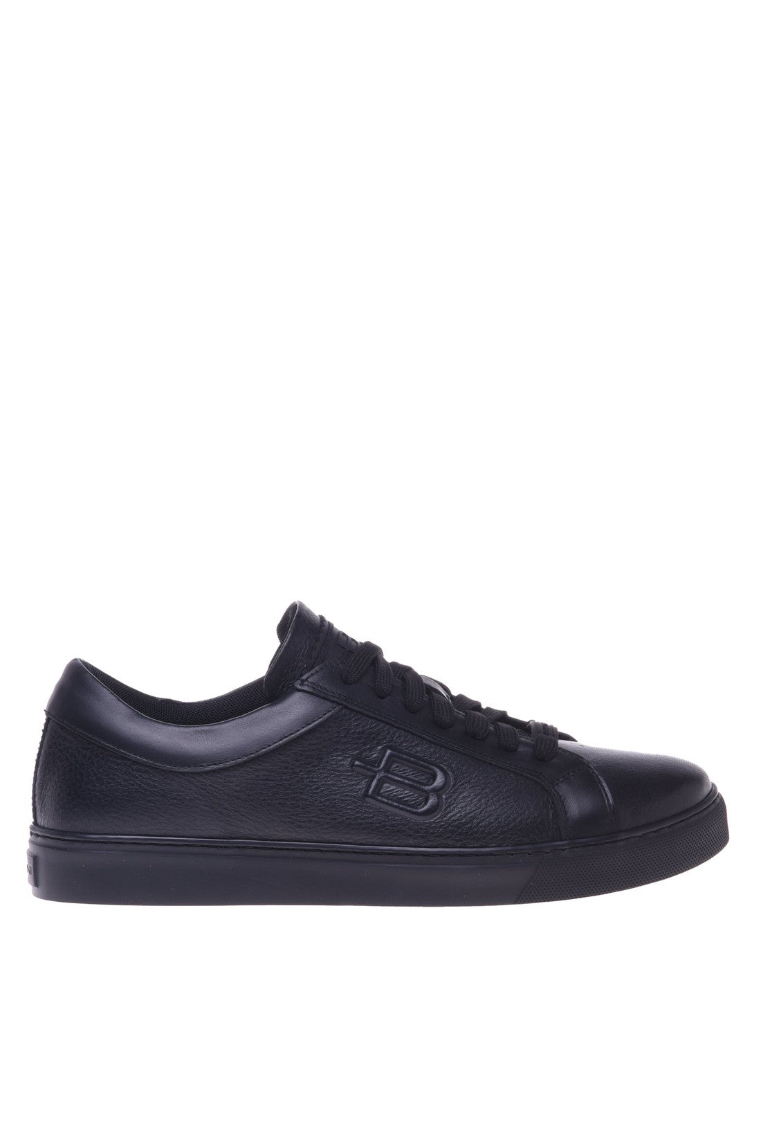 Trainers in black tumbled leather