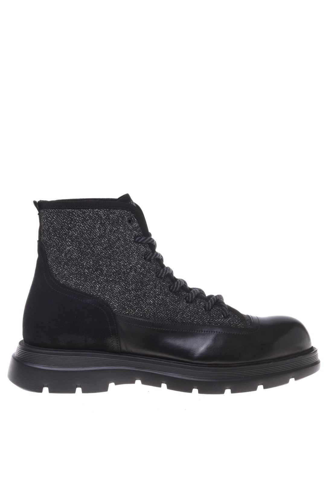 Combat boot in black fabric and leather