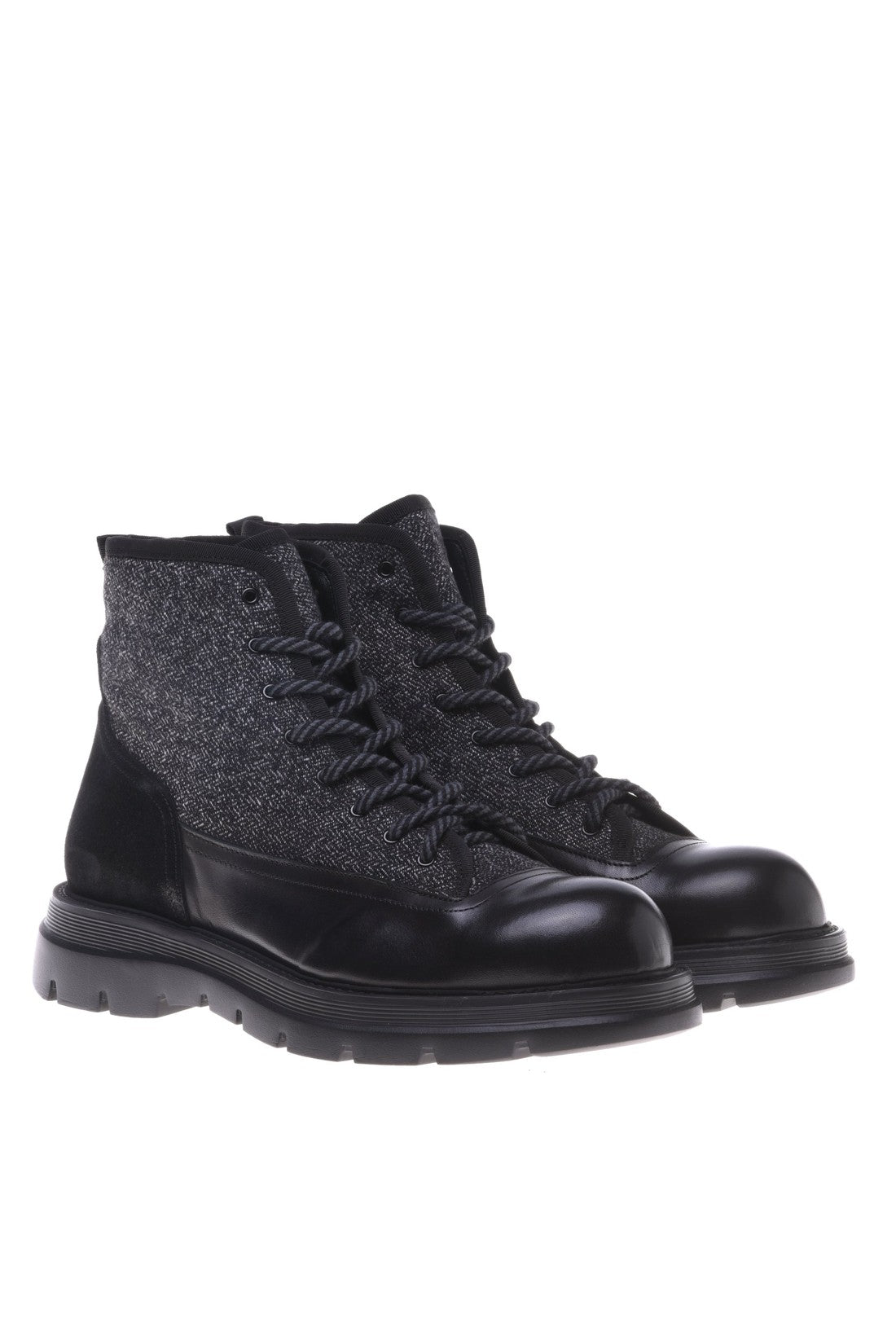 Combat boot in black fabric and leather