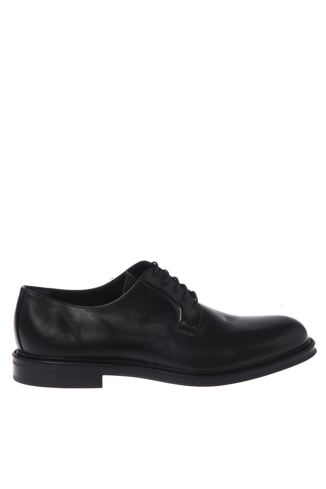 Black leather lace-up shoes