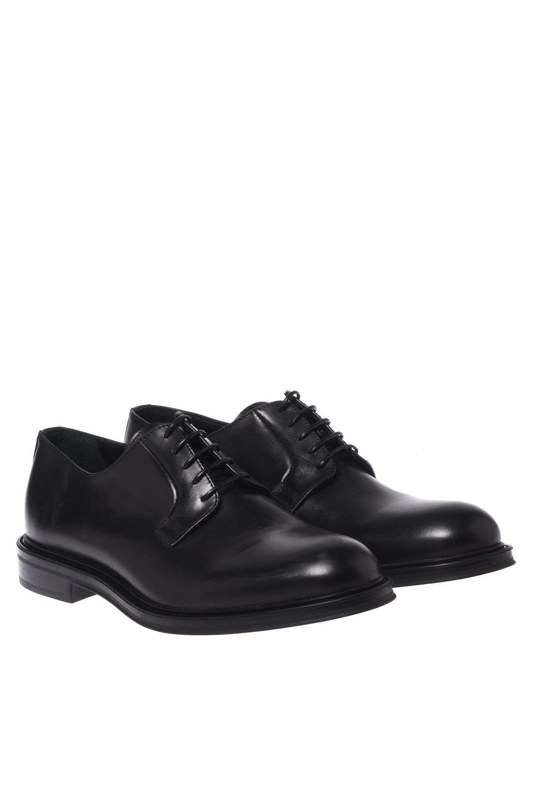 Black leather lace-up shoes