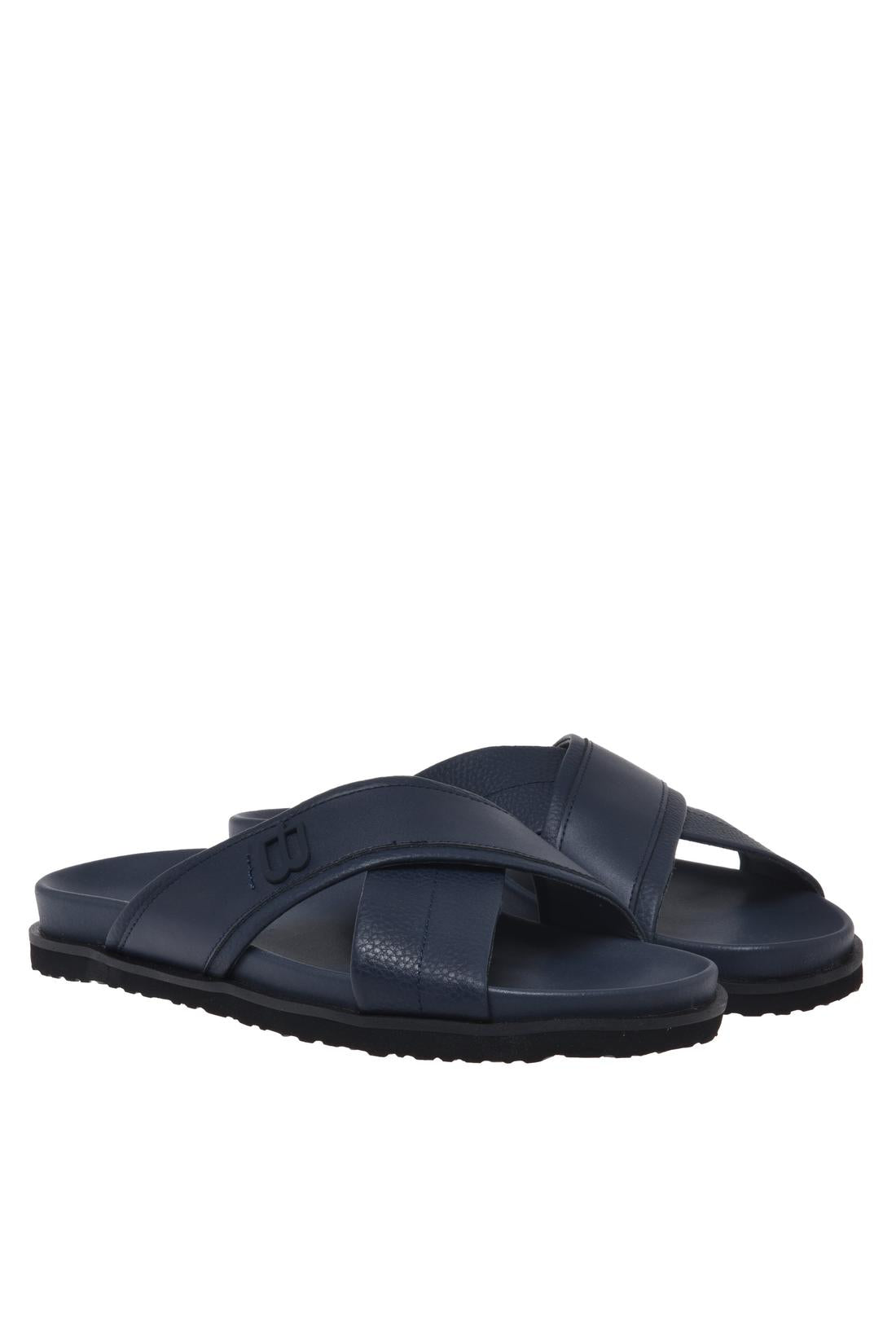Mule in blue tumbled and smooth leather