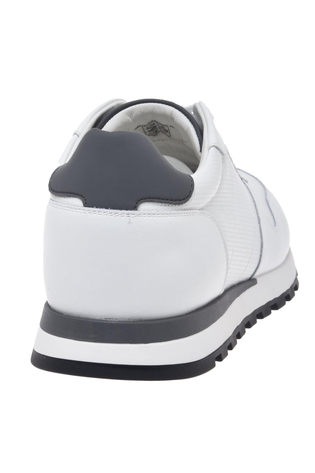 White leather sneaker with woven‑effect print