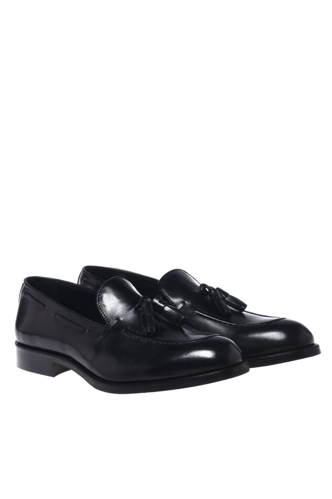Black leather slip-on shoes