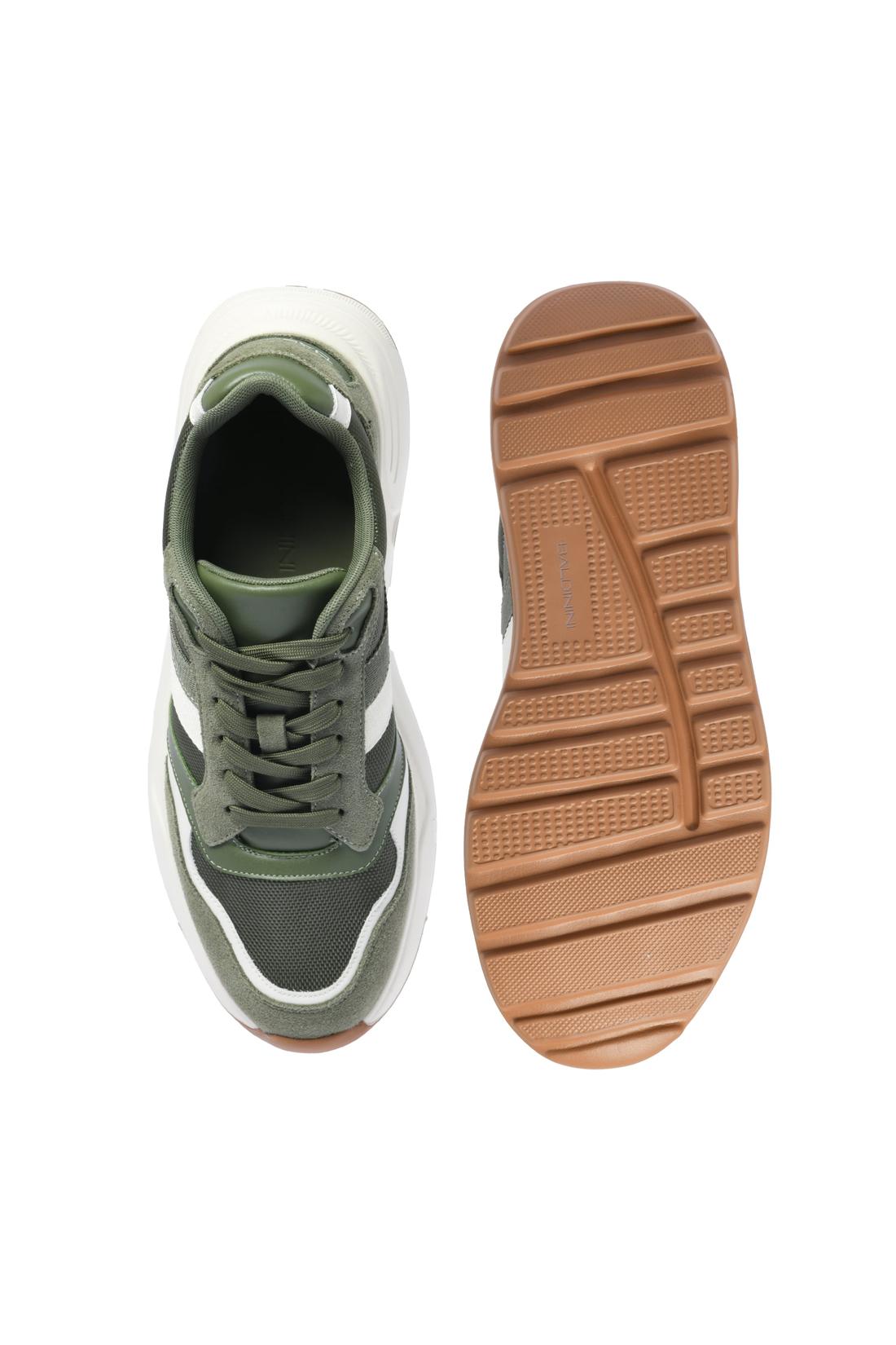Sneaker in green suede and fabric