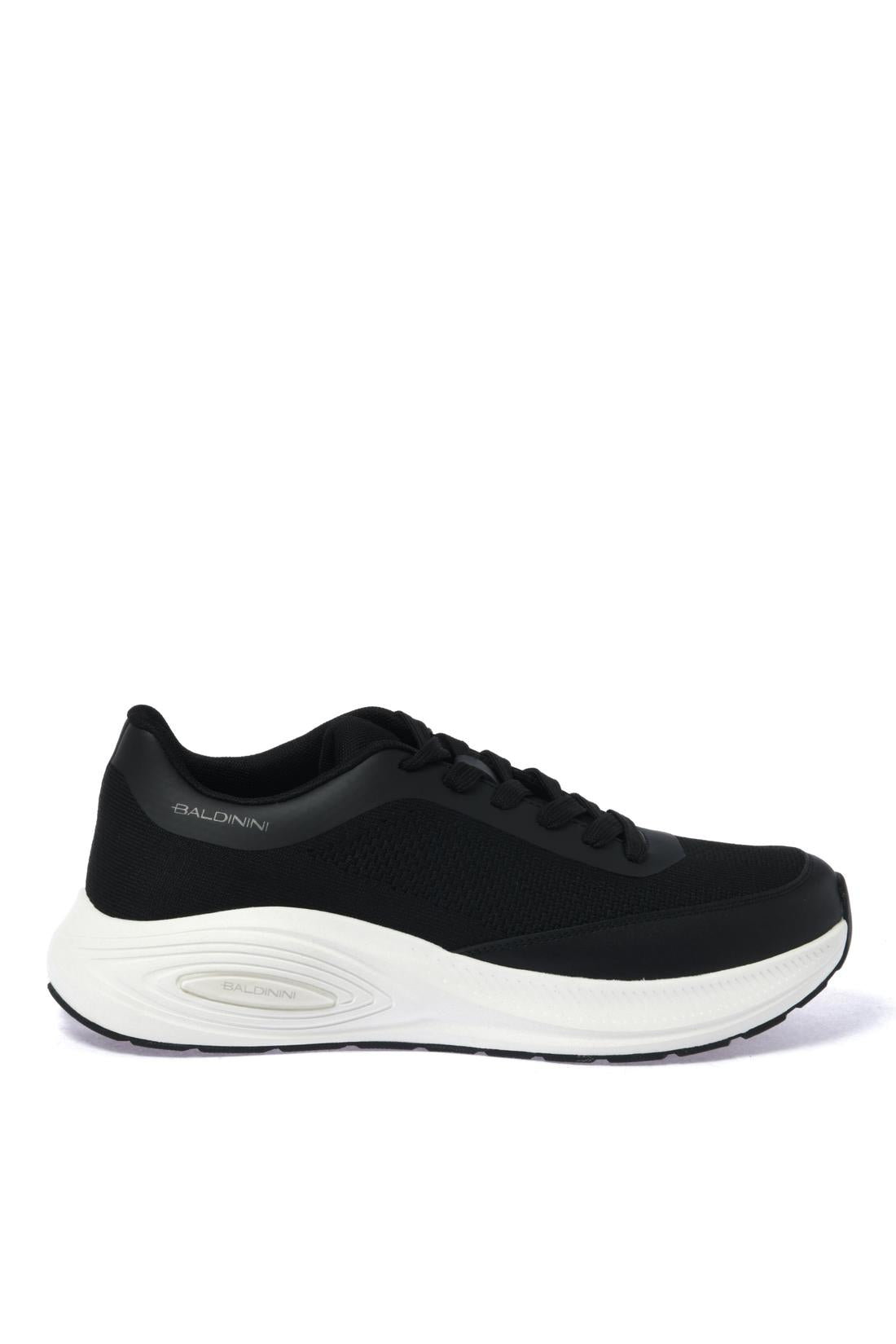Sneaker in leather and black fabric